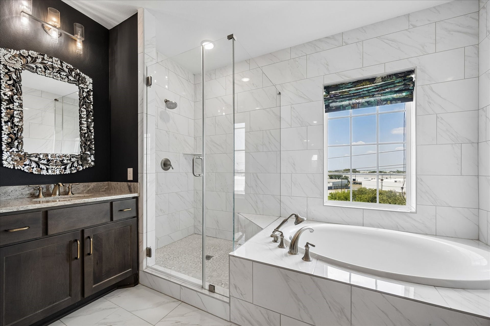3606 Somerset York Lane, Houston, TX 77055 The elegant bath creates a tranquil escape with a soaking tub, oversized shower, and abundant storage.