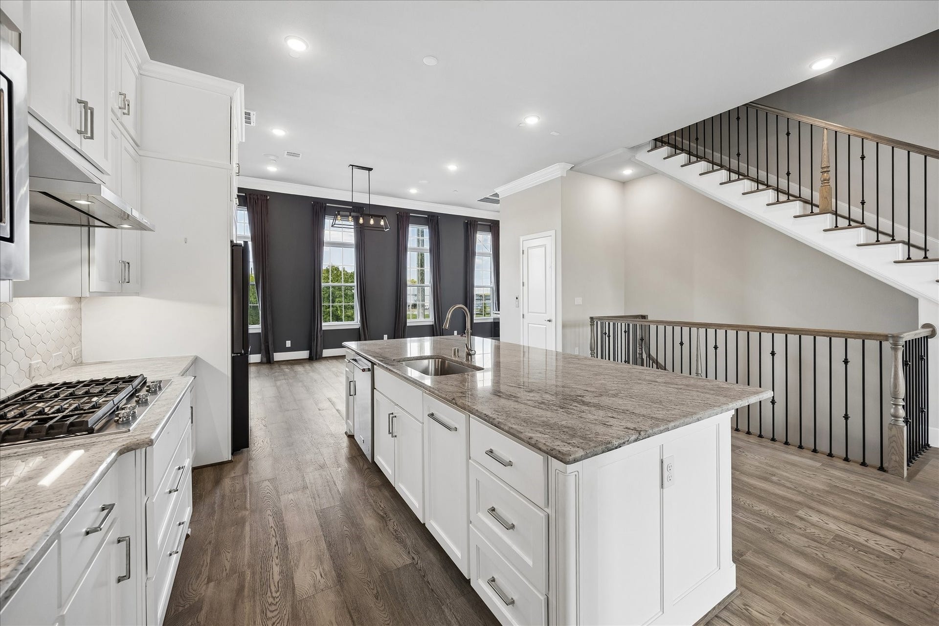 3606 Somerset York Lane, Houston, TX 77055 Designed to impress, the kitchen features generous prep space, premium appliances, abundant cabinetry, and a large island that serves as a natural gathering place for family and guests.