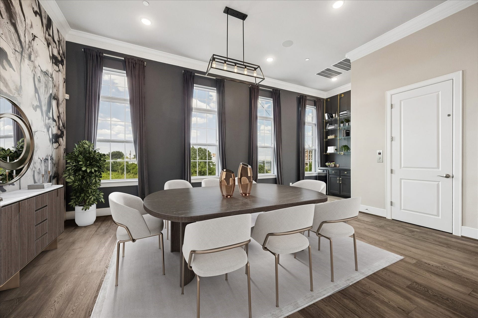 3606 Somerset York Lane, Houston, TX 77055 Gather family and friends in this light-filled dining space where every meal feels special.Photo virtually staged.
