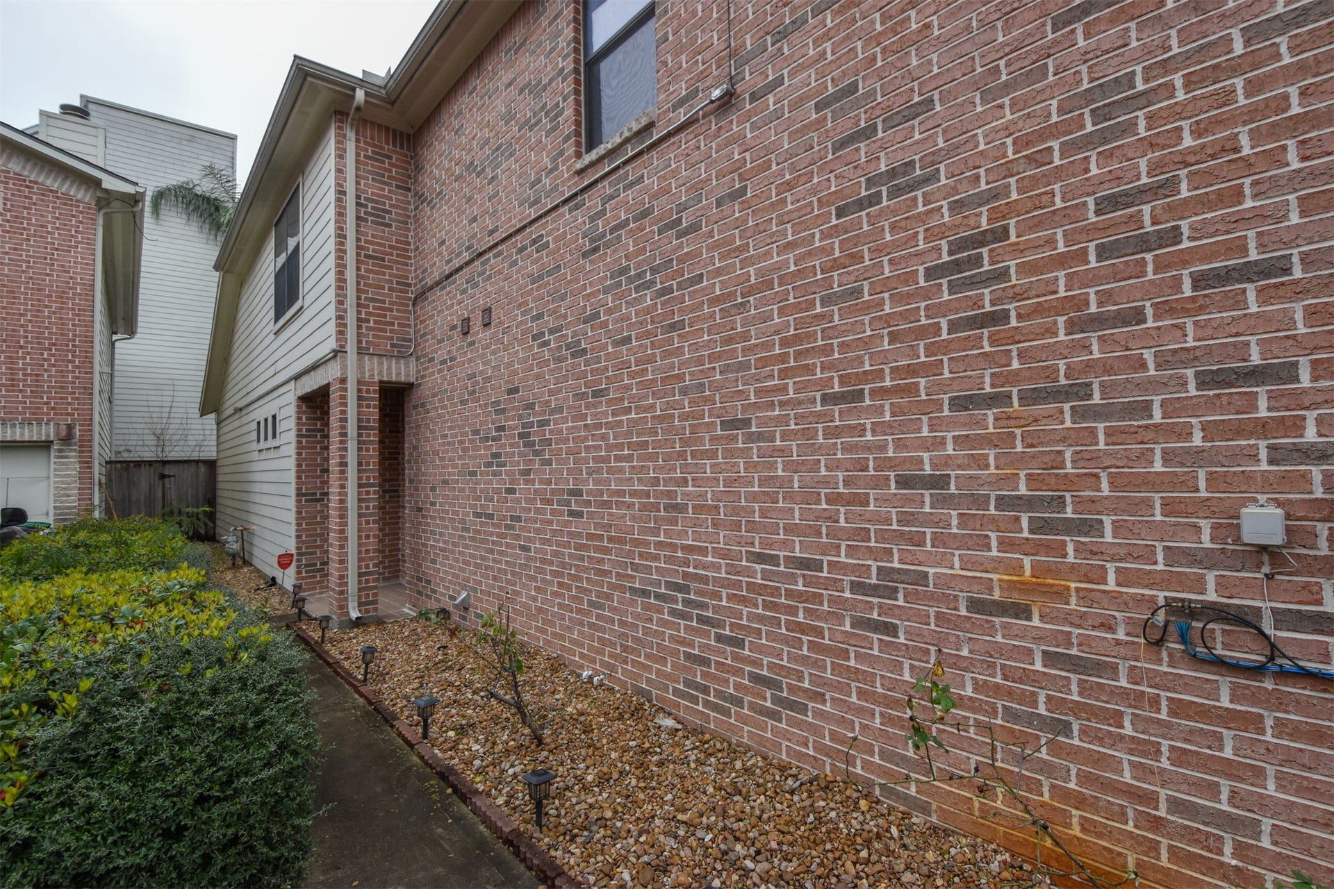 5710 Cornish Street, #1, Houston, TX 77007 Side view leading to Front door.