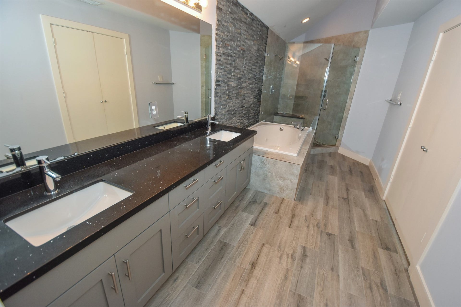 5710 Cornish Street, #1, Houston, TX 77007 Another view of updated Bathroom with Granite counter & dual sinks. .