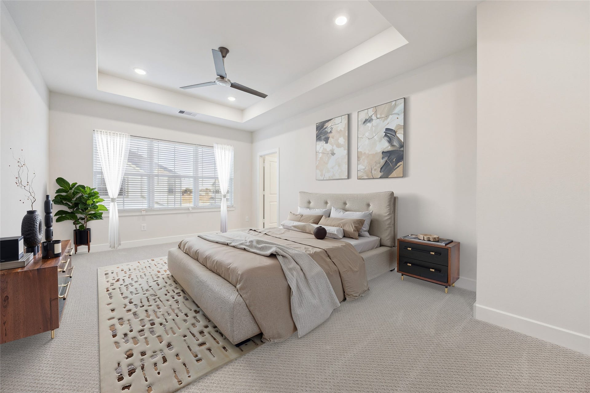 24412 Colonial Mound Drive, Katy, TX 77493 Virtually staged primary bedroom representative photo. Layout and selections may vary.
