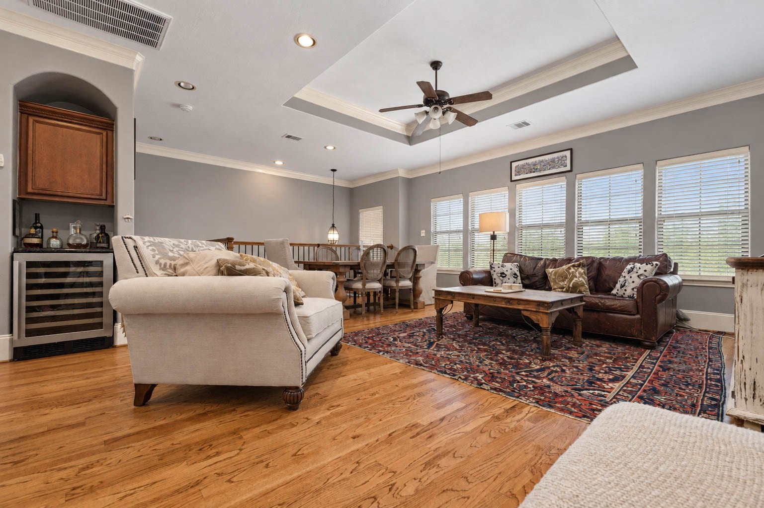 1316 Studer Street, Houston, TX 77007 Designed with an open and inviting layout, the main living level brings the family room, dining area, and kitchen together while still allowing each space to feel distinct.