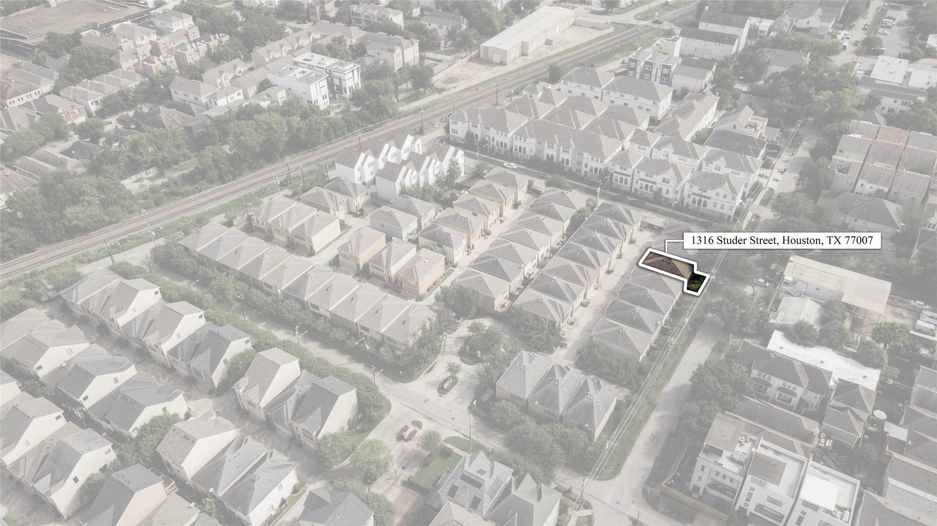 1316 Studer Street, Houston, TX 77007 A sweeping aerial captures the broader neighborhood surrounding Memorial Park Village, showcasing its central location among established residential communities and Houstons expanding urban landscape.