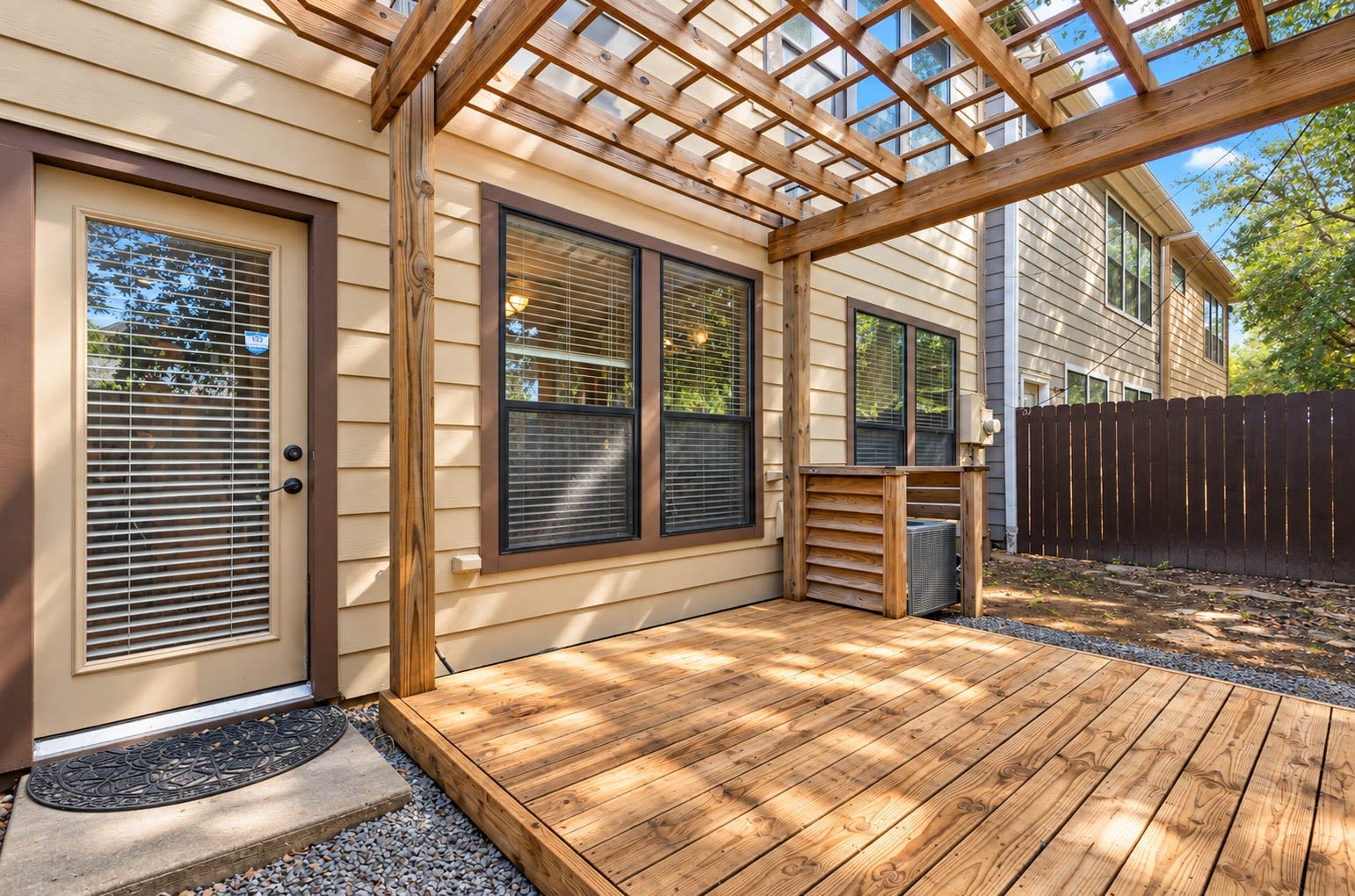 1316 Studer Street, Houston, TX 77007 The pergola-style covering adds architectural character and welcome shade to the outdoor living space, creating a natural extension of the interior.