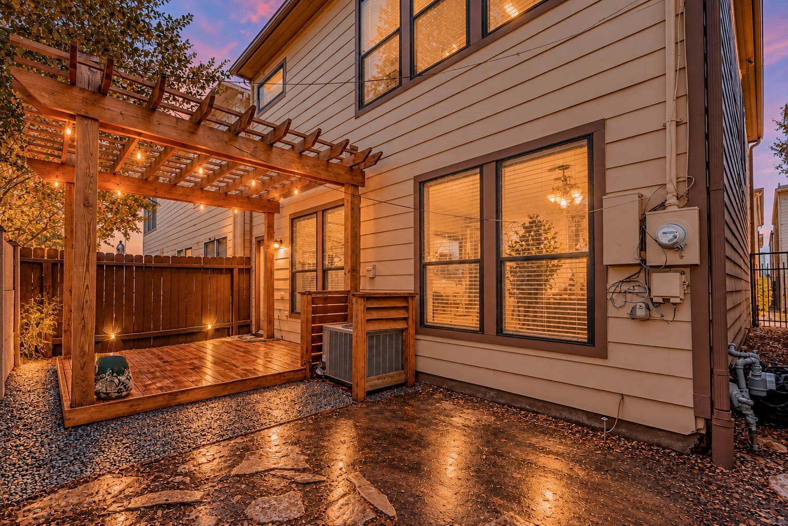 1316 Studer Street, Houston, TX 77007 As evening falls, the outdoor living space takes on an especially inviting character.