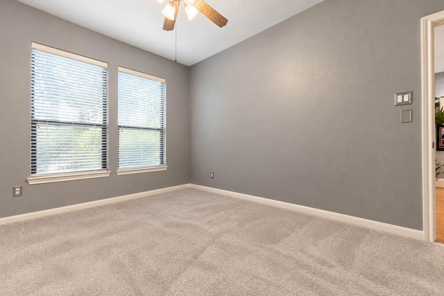 1316 Studer Street, Houston, TX 77007 A second view of the downstairs bedroom emphasizes its comfortable proportions and bright, airy feel. Its location away from the second-floor primary suite creates added privacy for guests or household members.