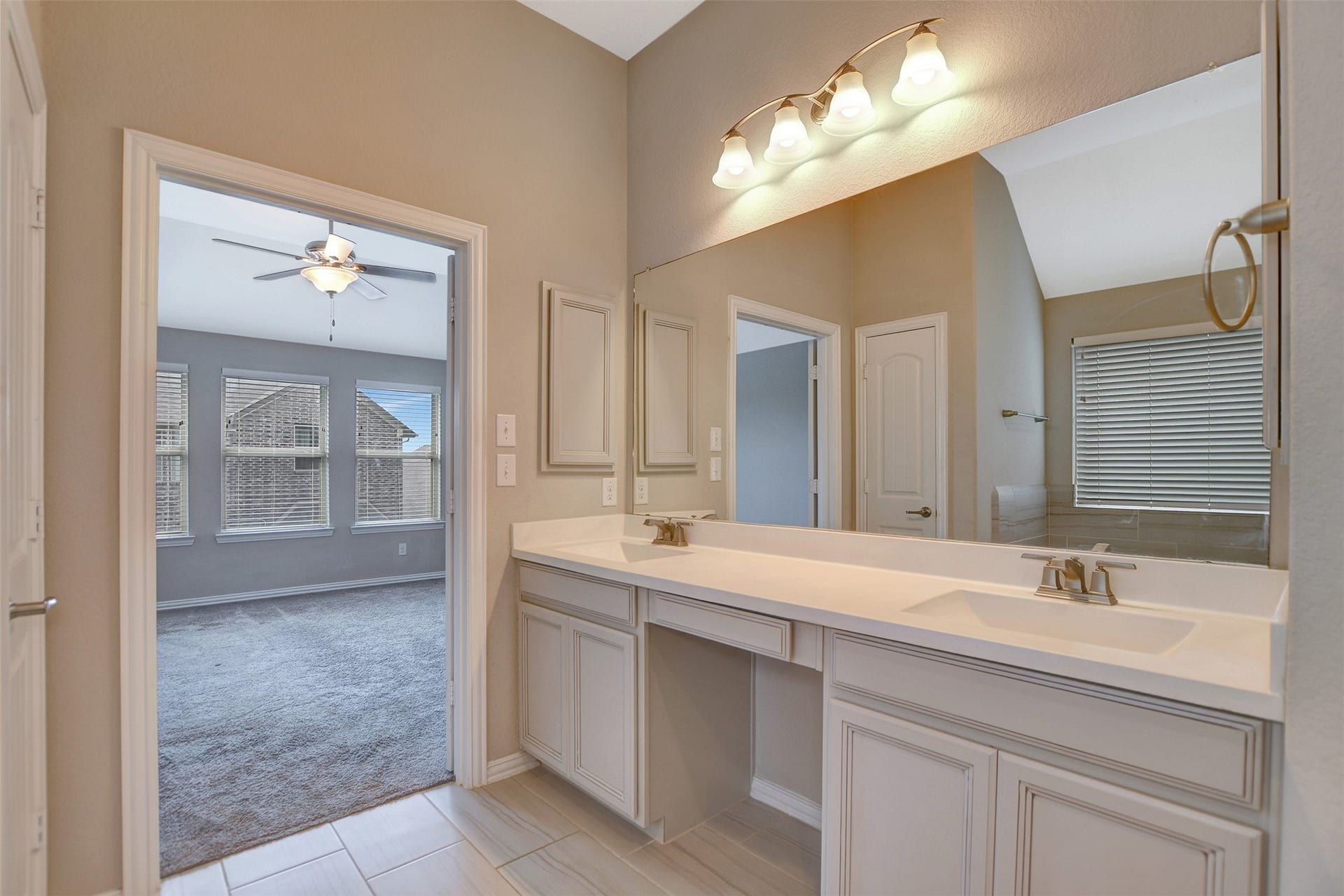 23623 San Ricci Court, Richmond, TX 77406 Upgraded cabinets and large mirror.