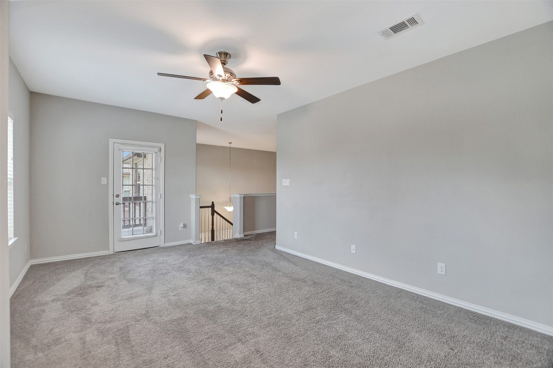 23623 San Ricci Court, Richmond, TX 77406 Gameroom has access to the front balcony.