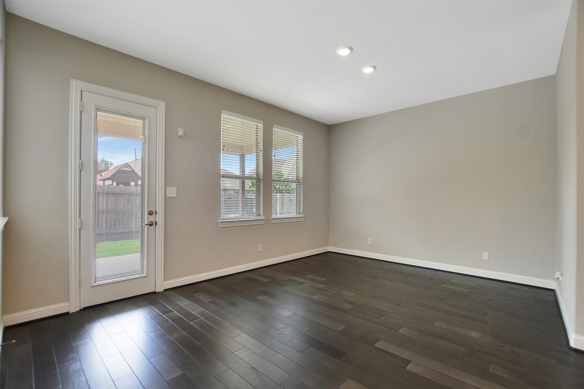 23623 San Ricci Court, Richmond, TX 77406 Access from the Breakfast area to the covered back patio.
