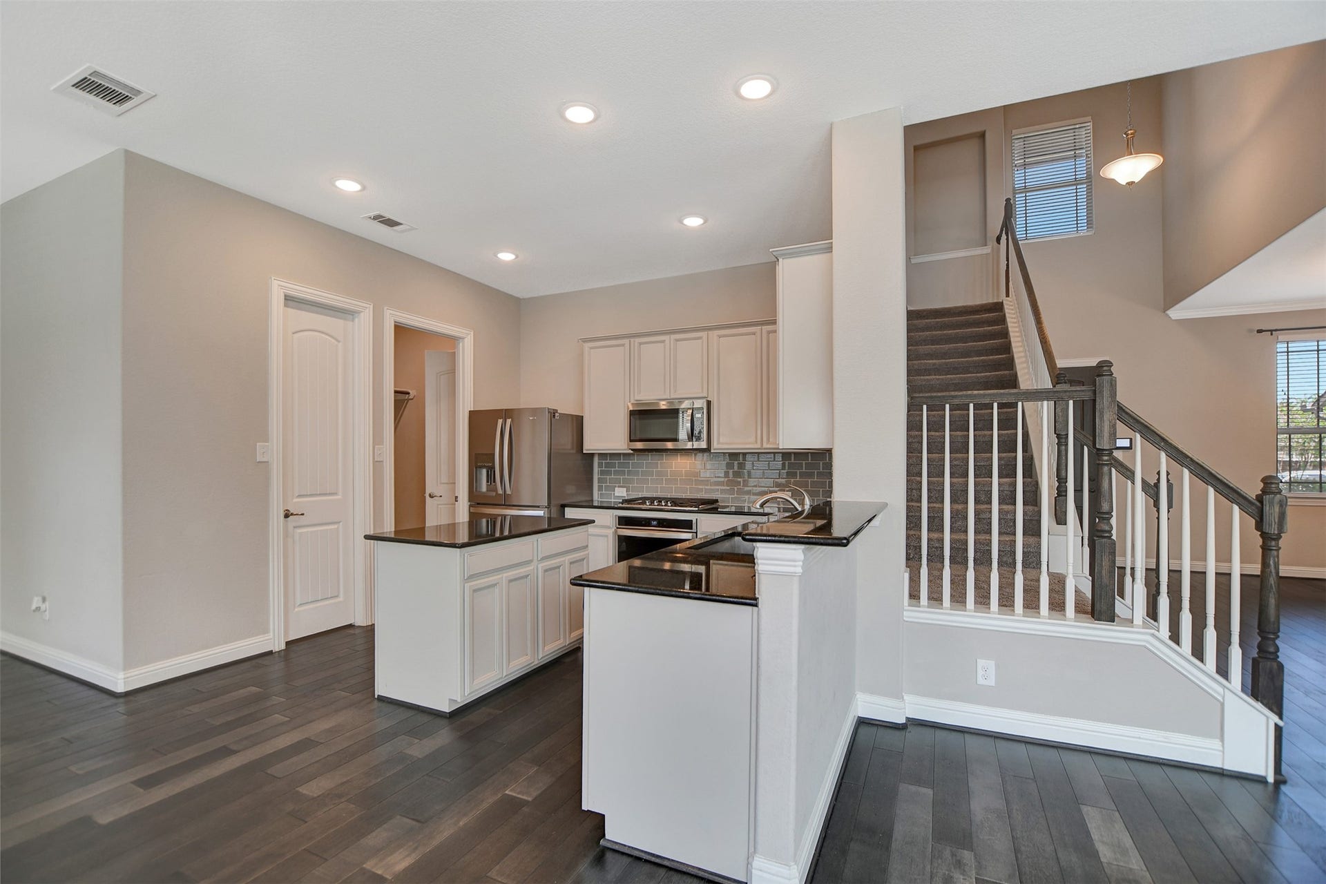 23623 San Ricci Court, Richmond, TX 77406 Beautiful black granite countertops.