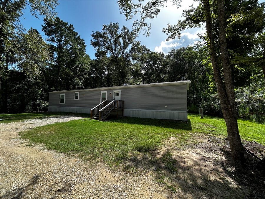 Property photo for 21191 Security Cemetary Road, Cleveland, TX