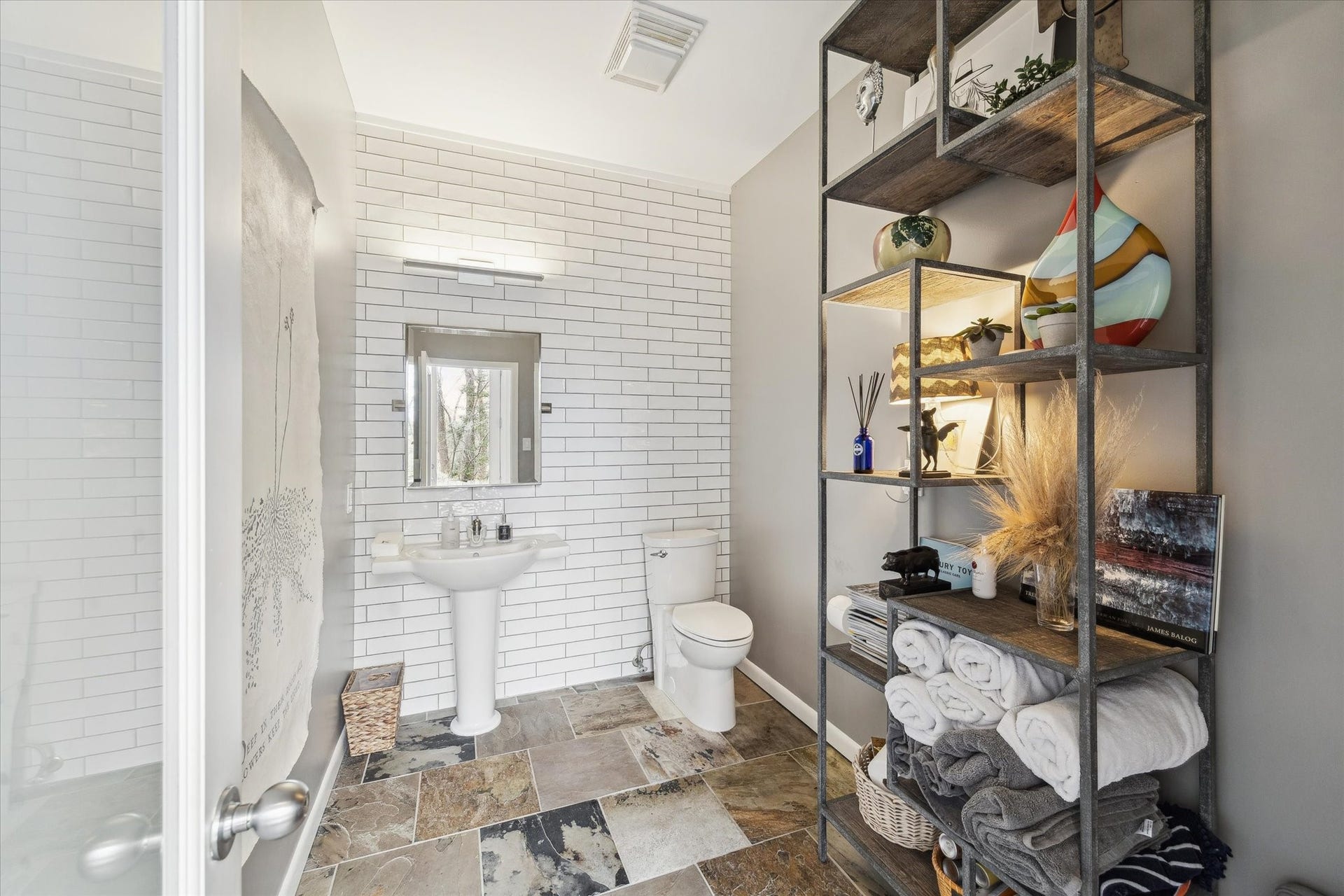 23414 Holly Hollow Street, Tomball, TX 77377 Tastefully finished poolside half bath, perfectly positioned to serve outdoor living and entertaining spaces.