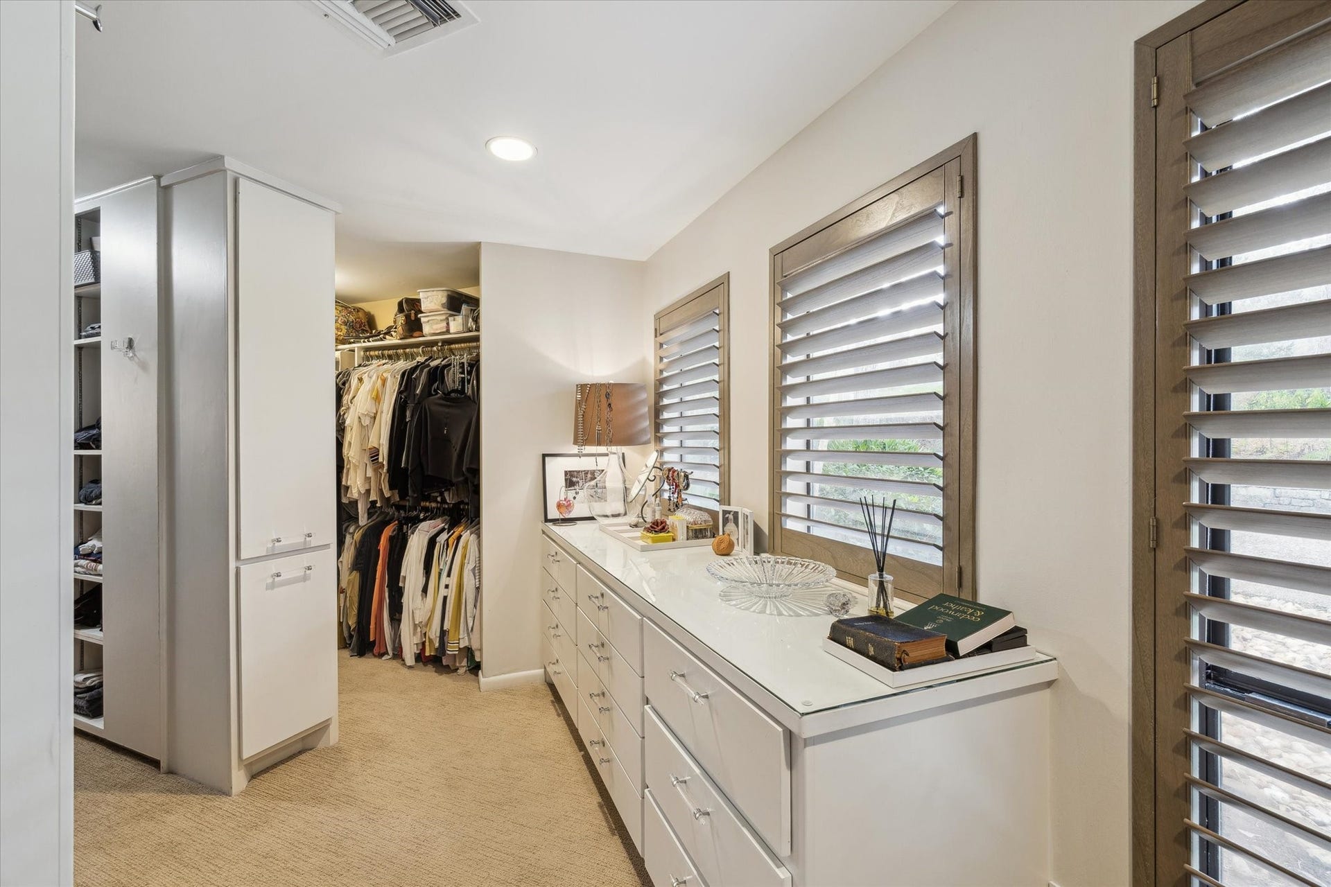 23414 Holly Hollow Street, Tomball, TX 77377 Abundant storage throughout, including custom and walk-in closets, maximizing organization and functionality.