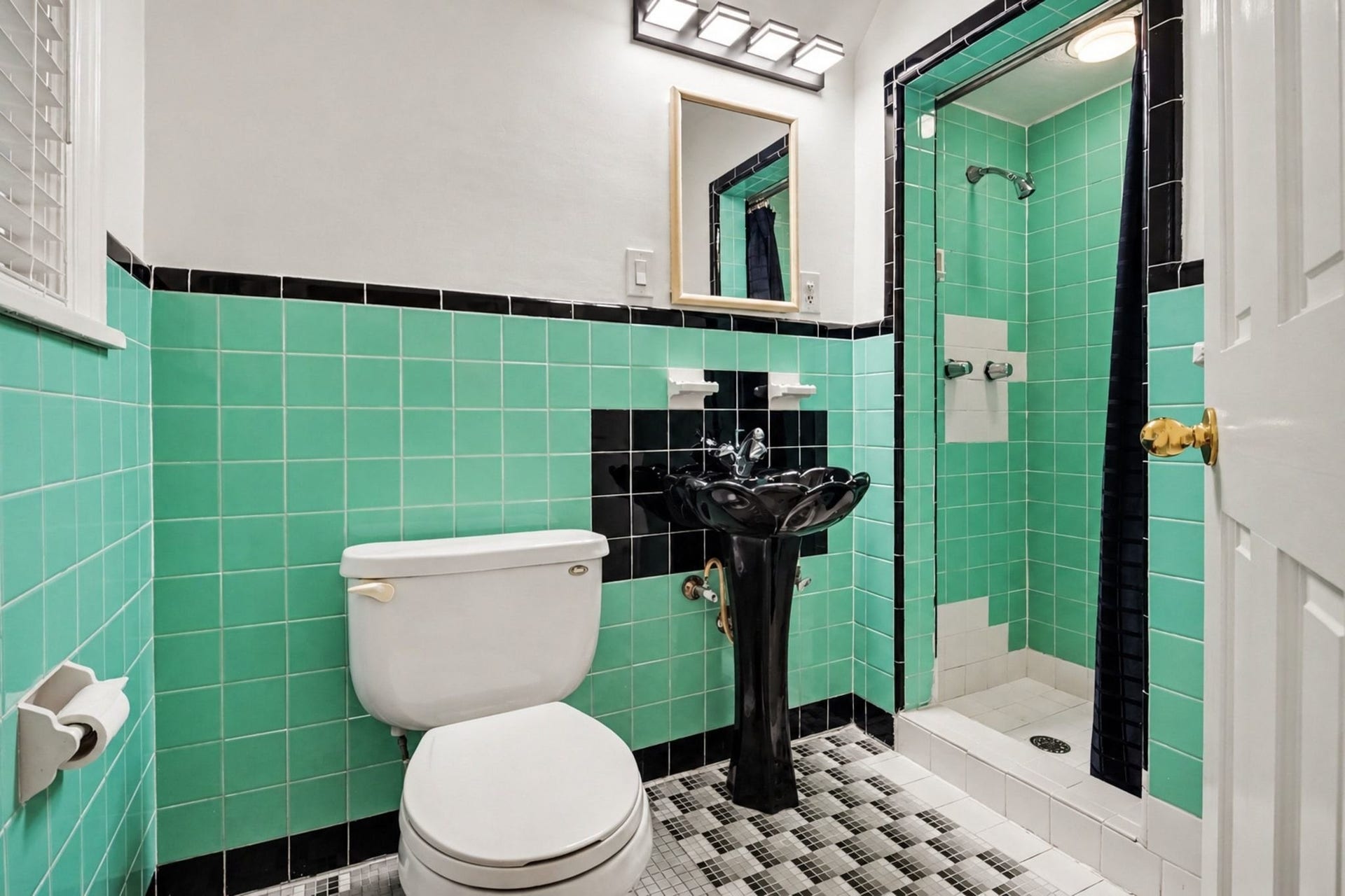 4408 Yoakum Boulevard, #4, Houston, TX 77006 Second primary bath with vintage tile features a walk in shower.
