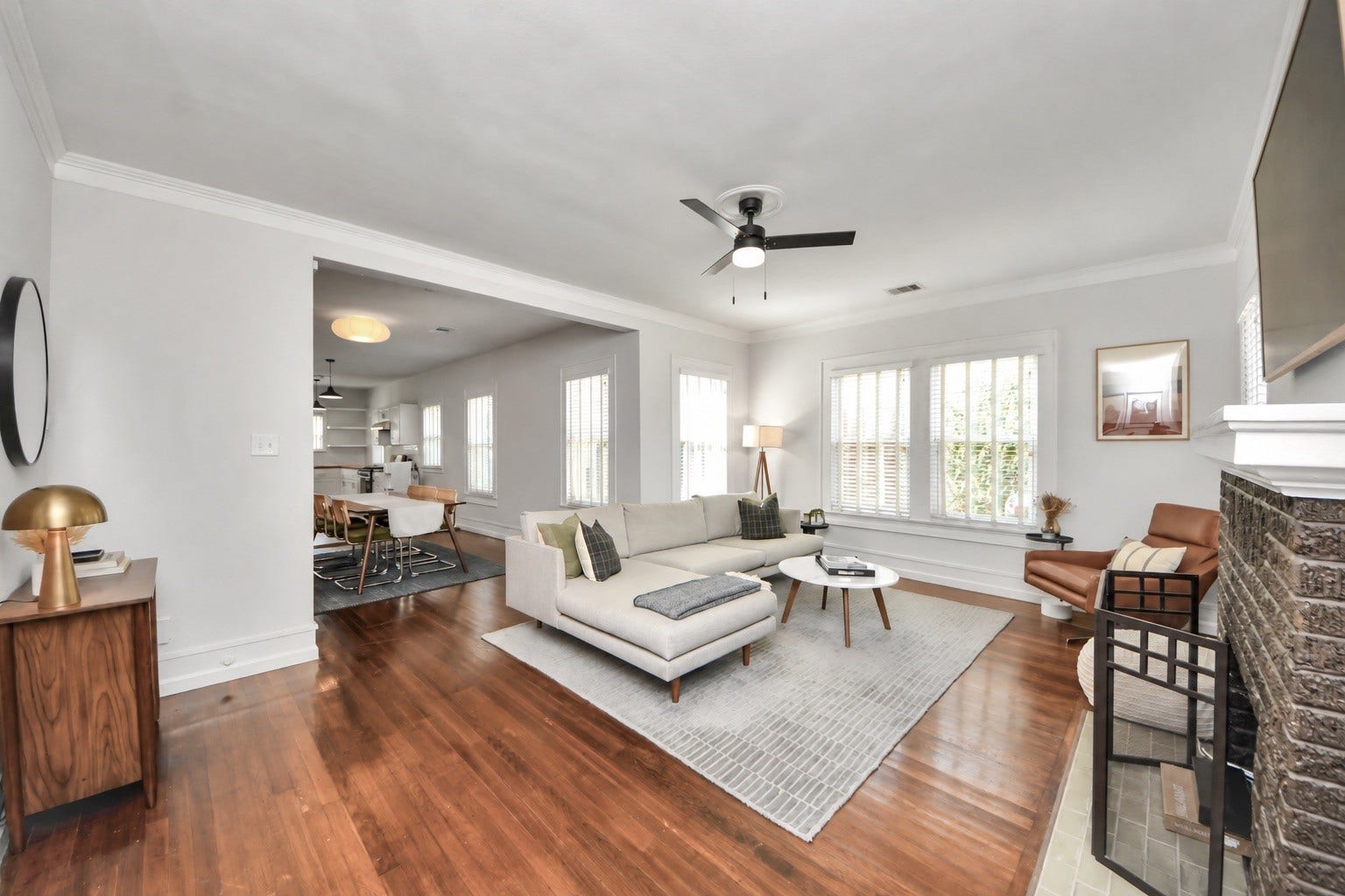 Warm and inviting, the living room showcases hardwood floors that bring timeless character to this beautifully maintained 1941 bungalow.