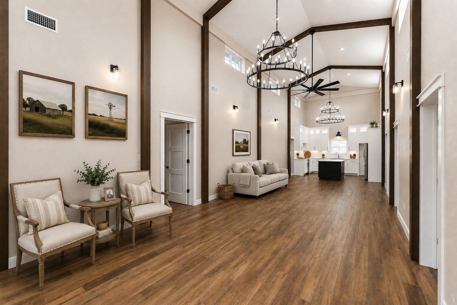 4864 County Road 182 Off, Alvin, TX 77511 This spacious room features high ceilings with elegant chandeliers and exposed beams, complemented by warm tile wood-style flooring. It leads into a modern kitchen with white cabinetry and an island, offering an open, airy feel perfect for both entertaining and everyday living. AI decorated photo.