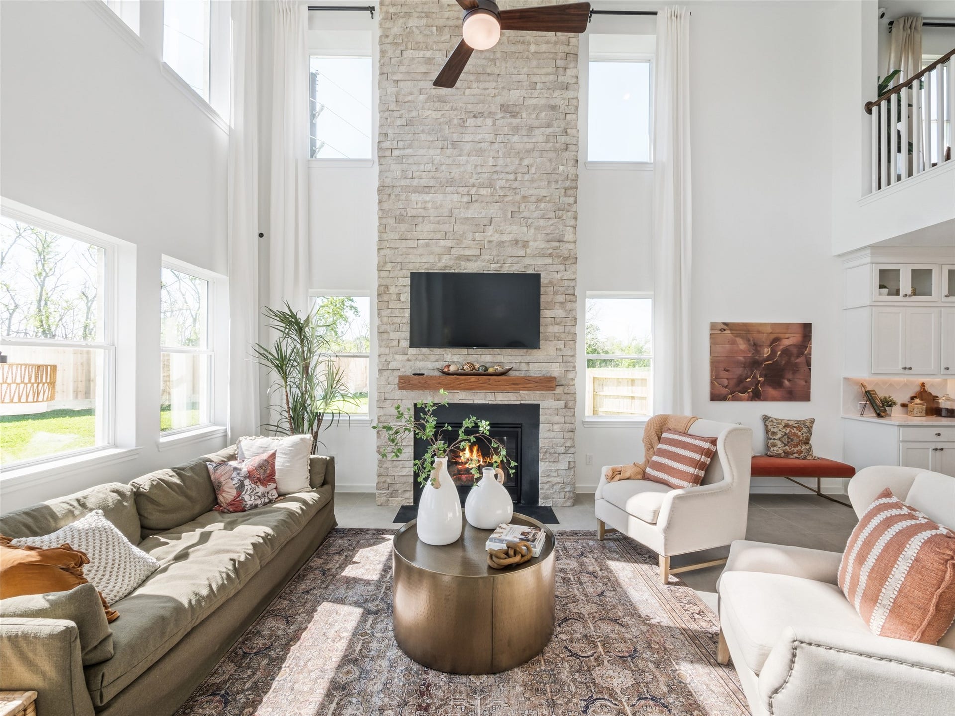 Impressive great room with cozy fireplace (*Photo not of actual home and used for illustration purposes only.)