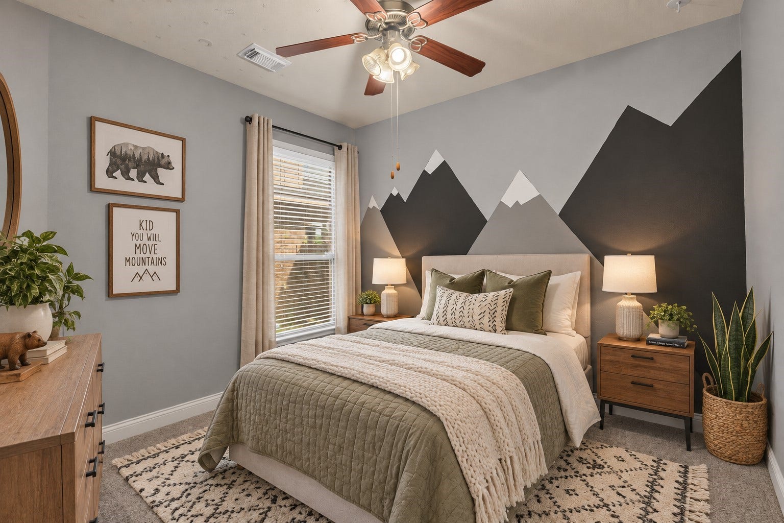 Cozy secondary bedroom with a beautiful mountain accent wall. (Virtually Staged)
