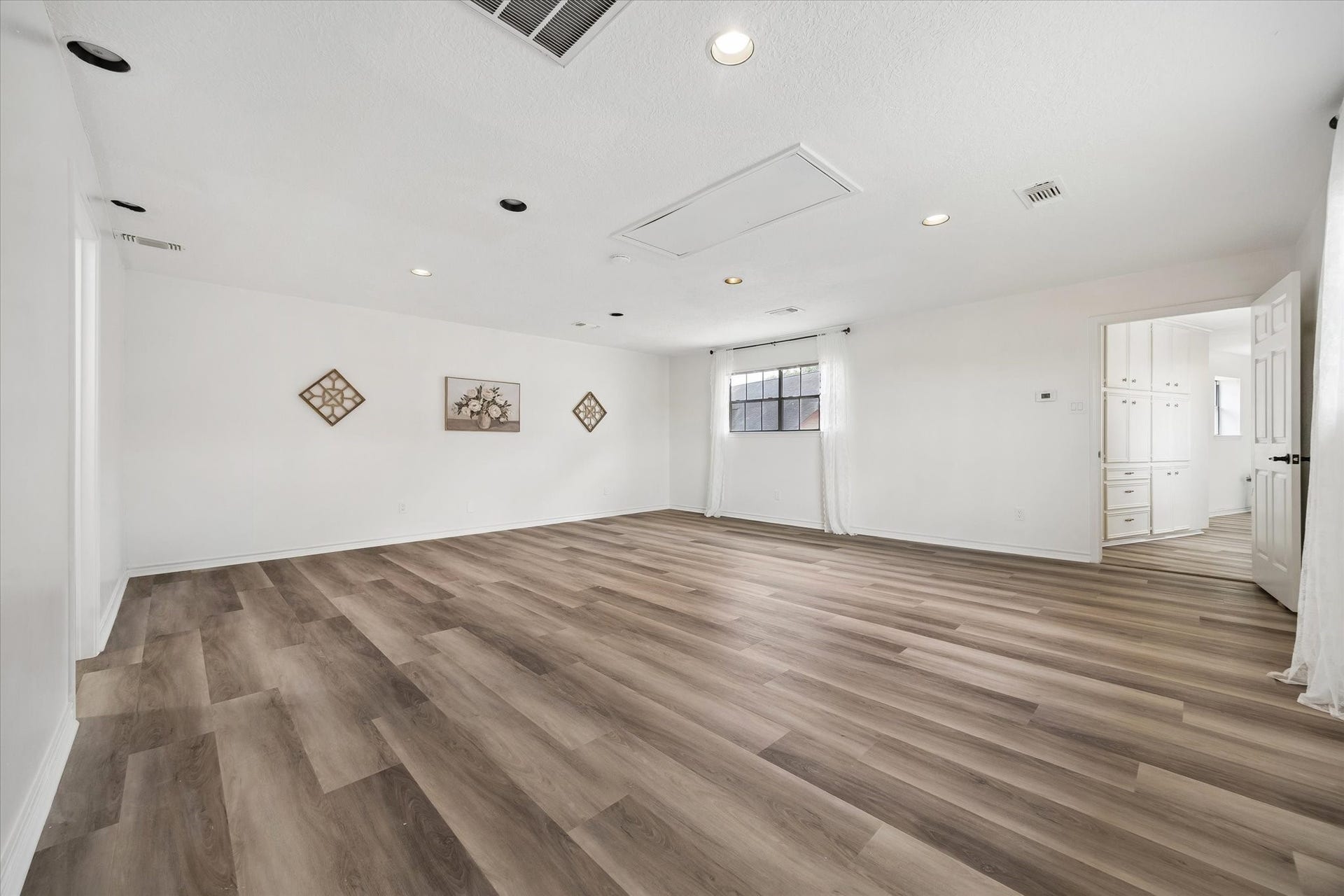 Connected with the main house through the hall way, this large, brand new second master bedroom with en suite bath is wonderful for multigenerational families. You can also rent it out for additional income.