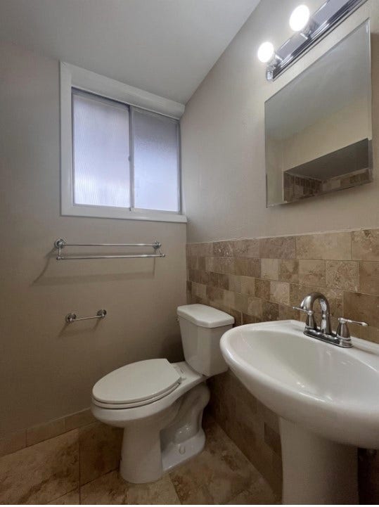 Pedestal sink is second sink for the bathroom