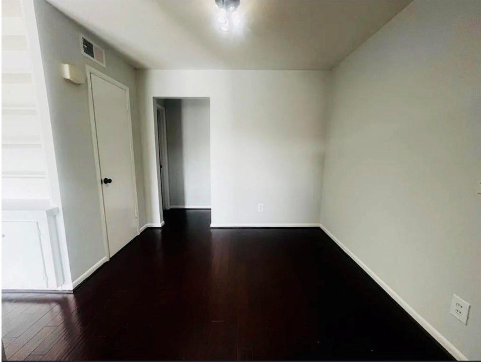 small dining area leading to bedroom hall