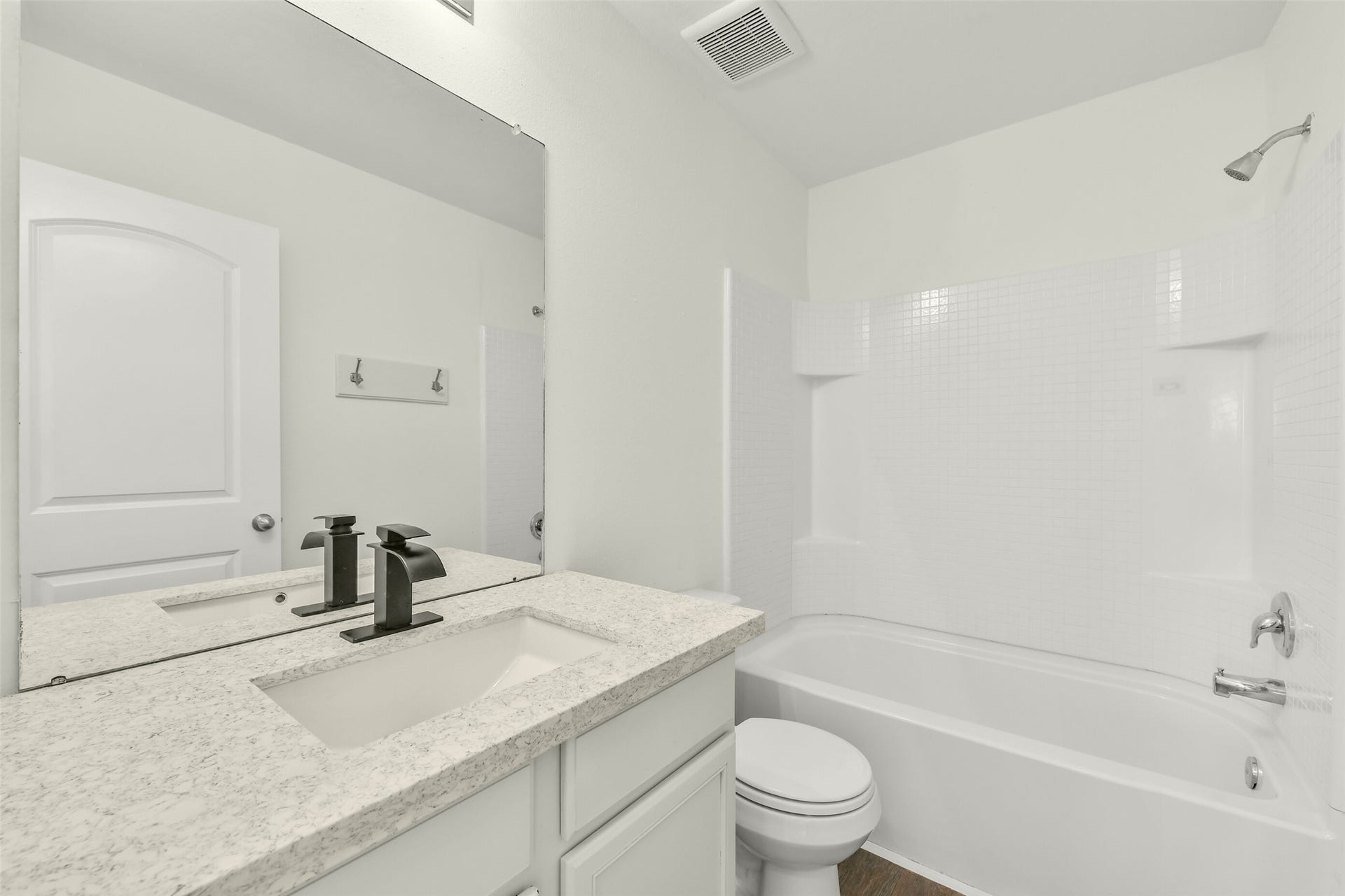 2921 Seacrest Lane, La Marque, TX 77568 Recently updated bathroom with sleek quartz countertops and modern sinks.