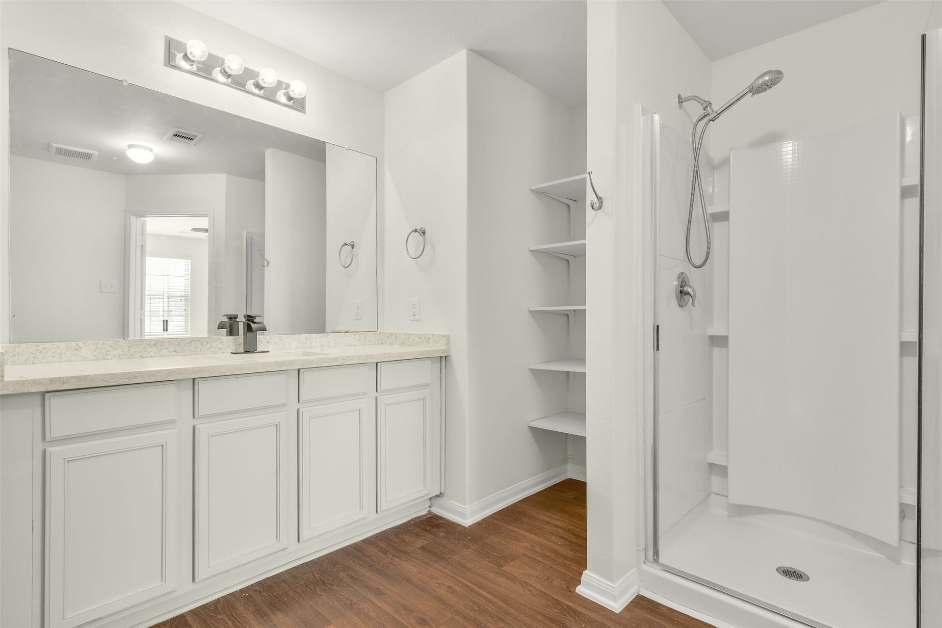 2921 Seacrest Lane, La Marque, TX 77568 Relaxing ensuite bath featuring garden tub, separate shower, and updated finishes.