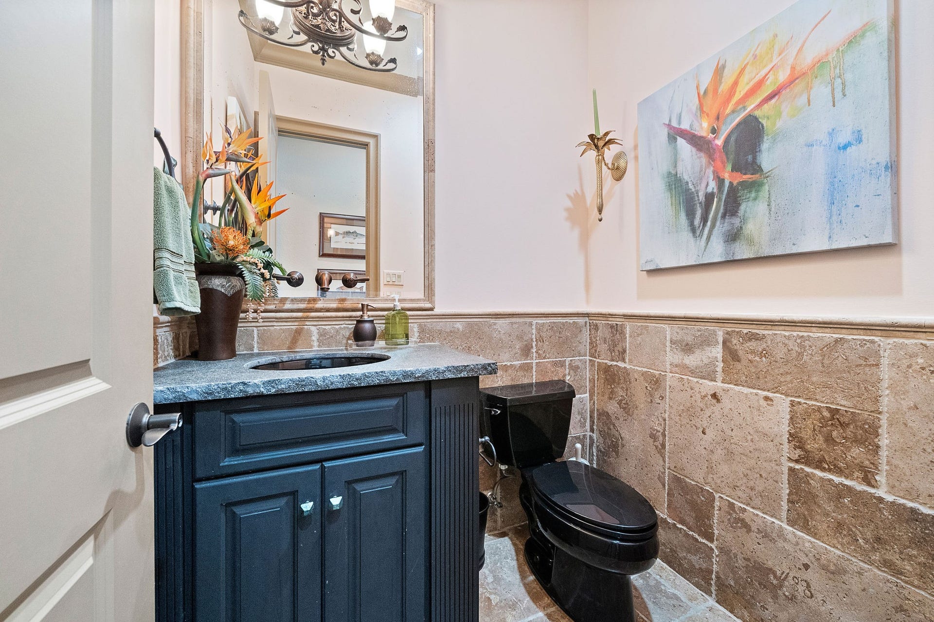21 Loggerhead, Hitchcock, TX 77563 Powder room with travertine surround located on main level for convenience