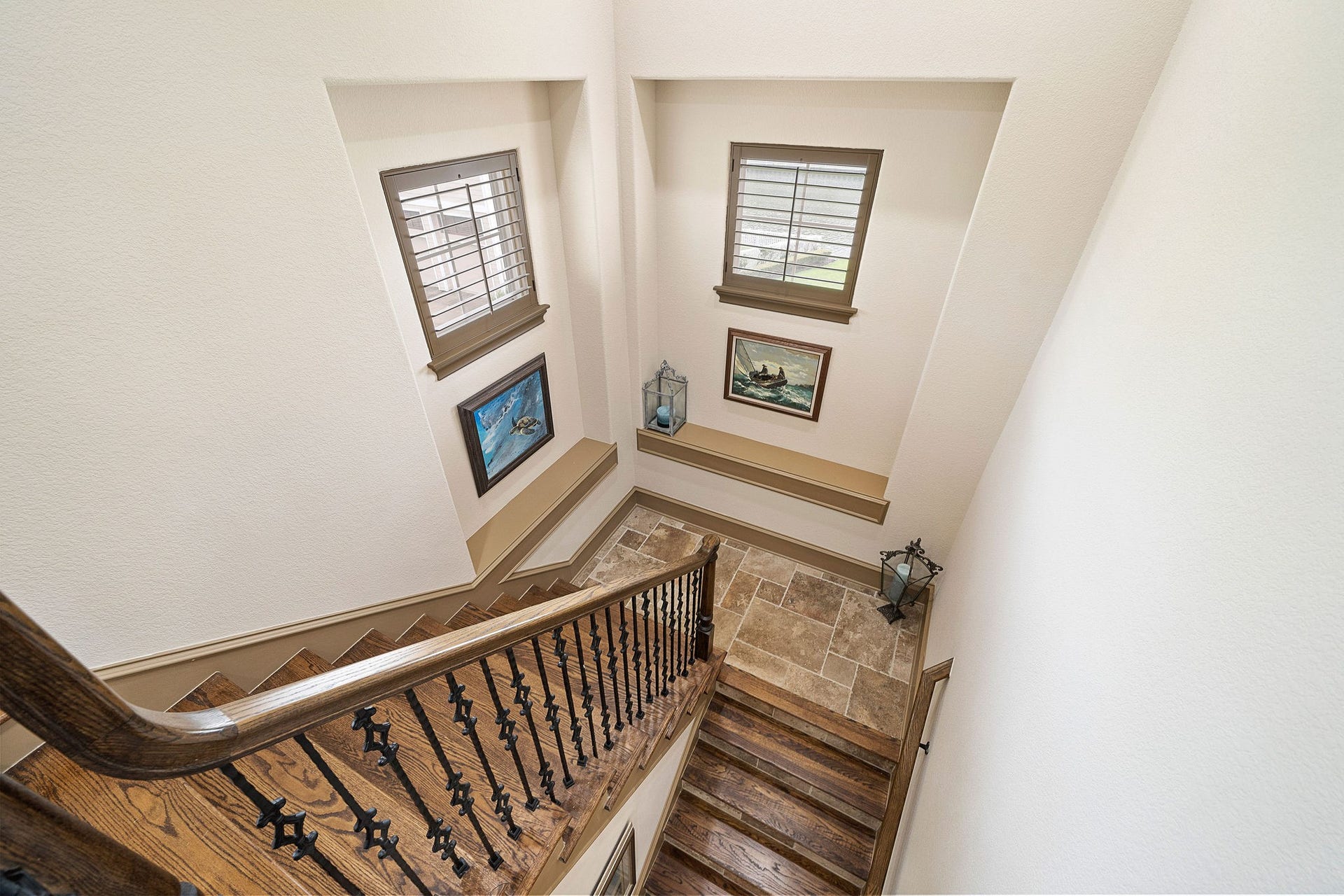 21 Loggerhead, Hitchcock, TX 77563 Elegant wood & travertine stairway with windows & shelving