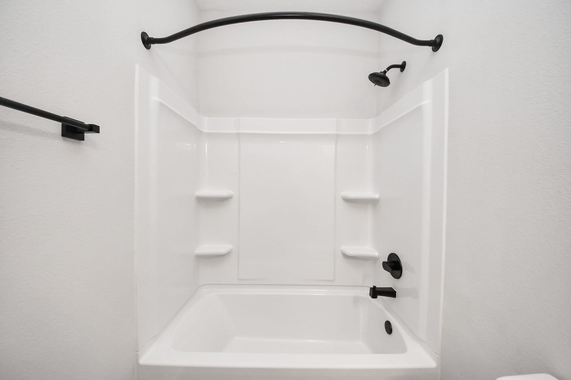 Primary Suite offers walk-closet,bath w/dual vanities&lux tub/shower.