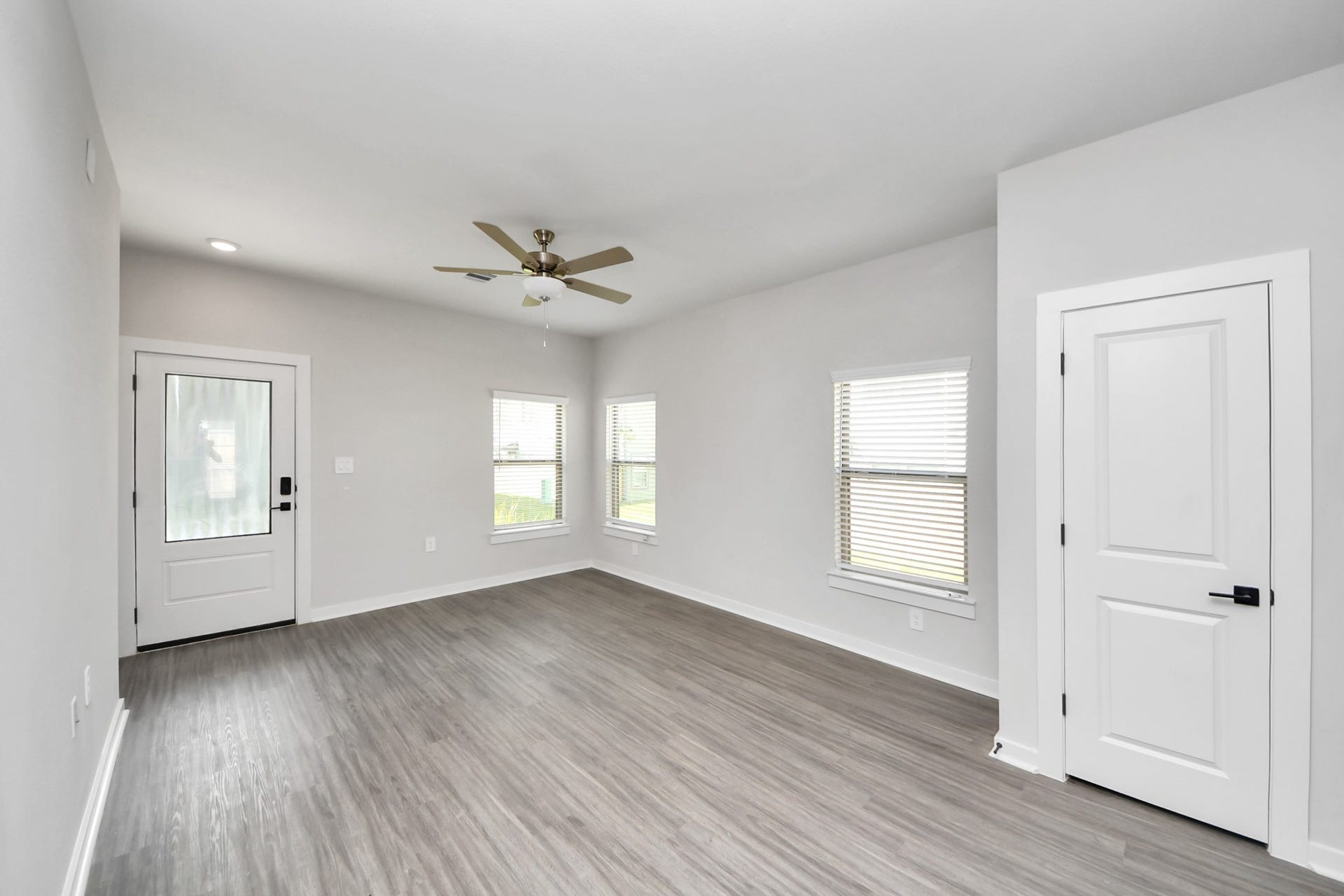 Open Concept Floor Plan with wood-like floors throughout!
