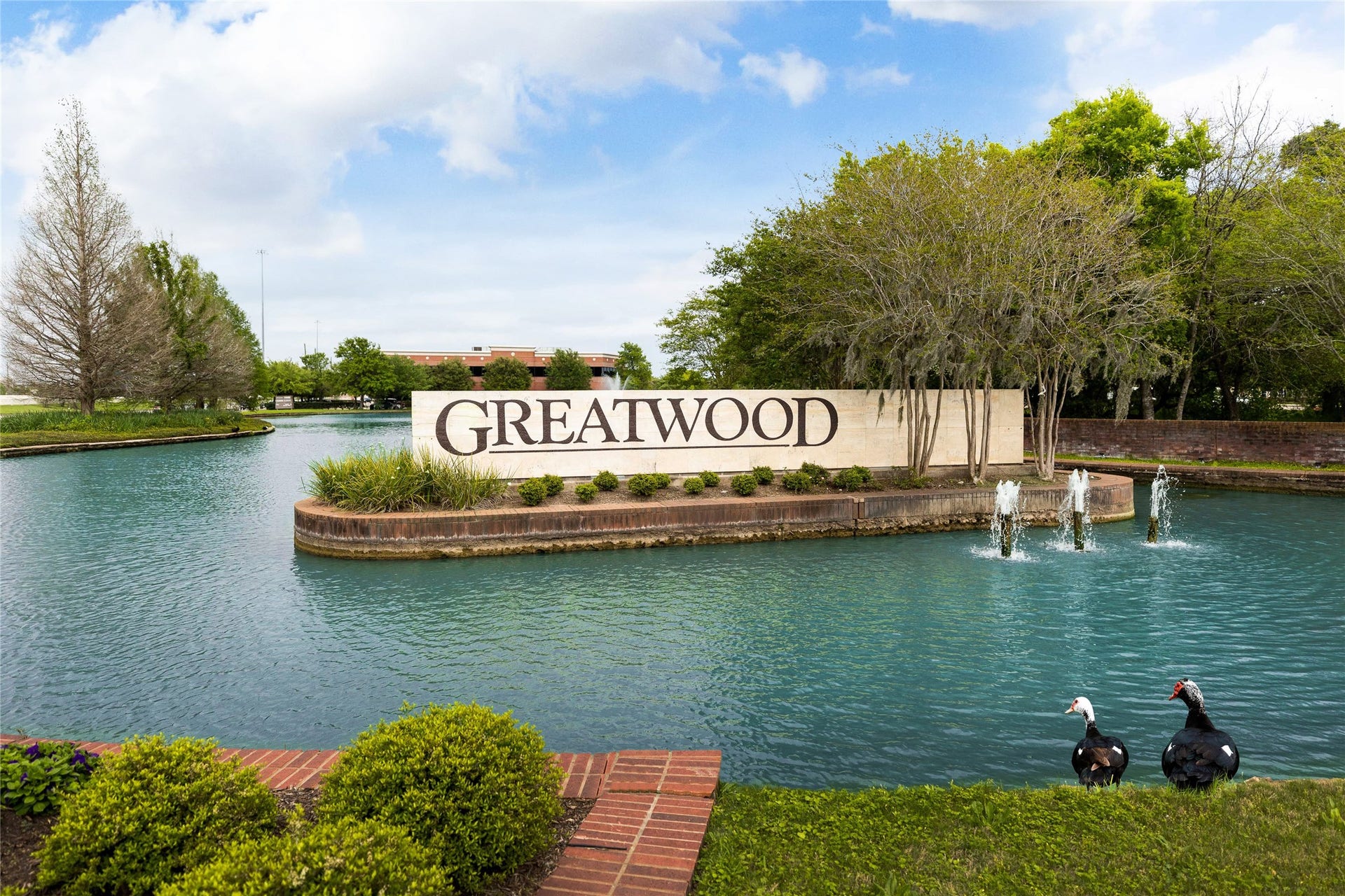 Welcome to Greatwood, a beautifully established community with scenic landscaping and neighborhood amenities.
