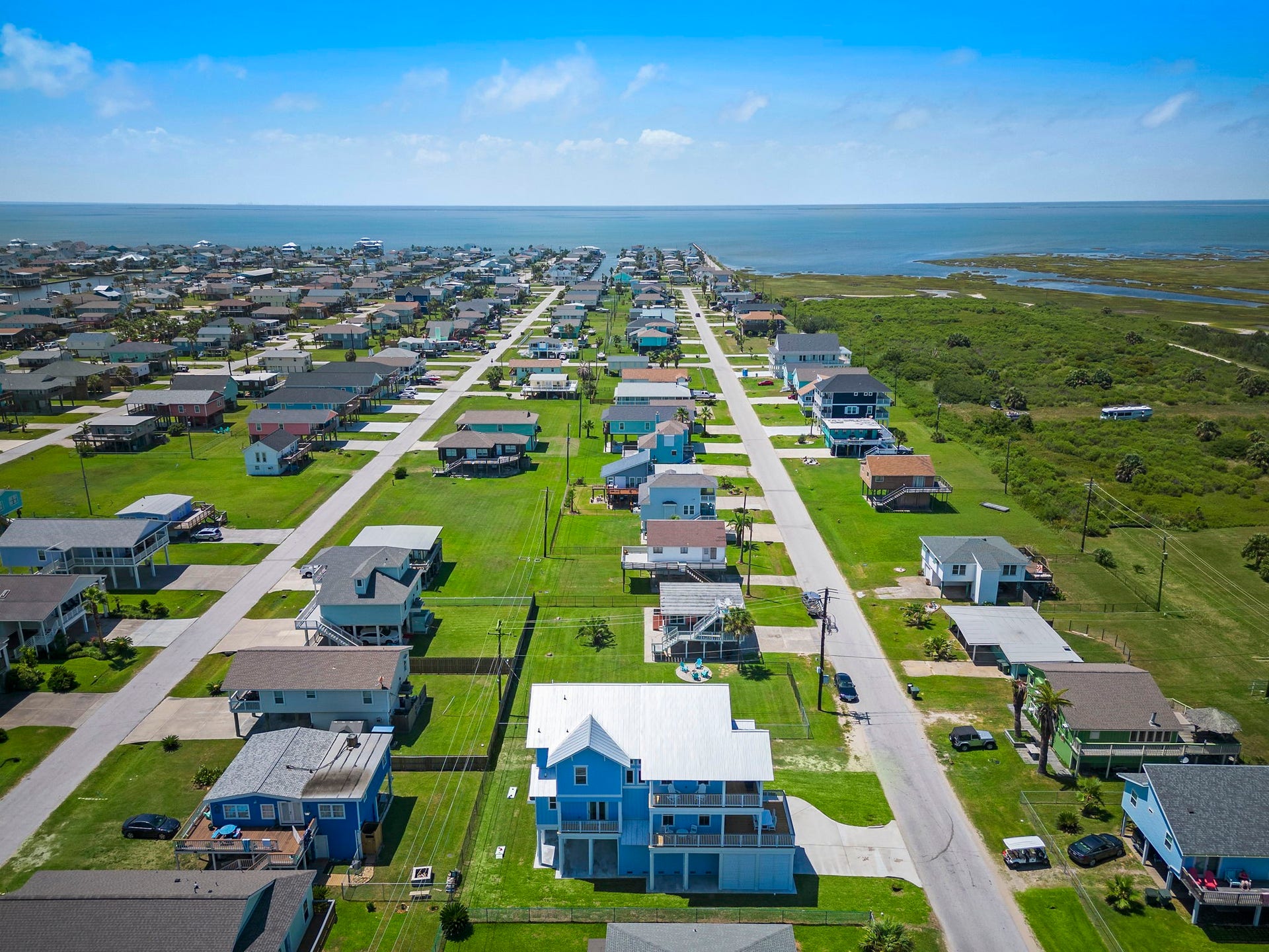 Coastal living at its finest with this charming neighborhood, featuring well-maintained homes and stunning ocean views in every direction. Perfect for those seeking a serene seaside retreat.