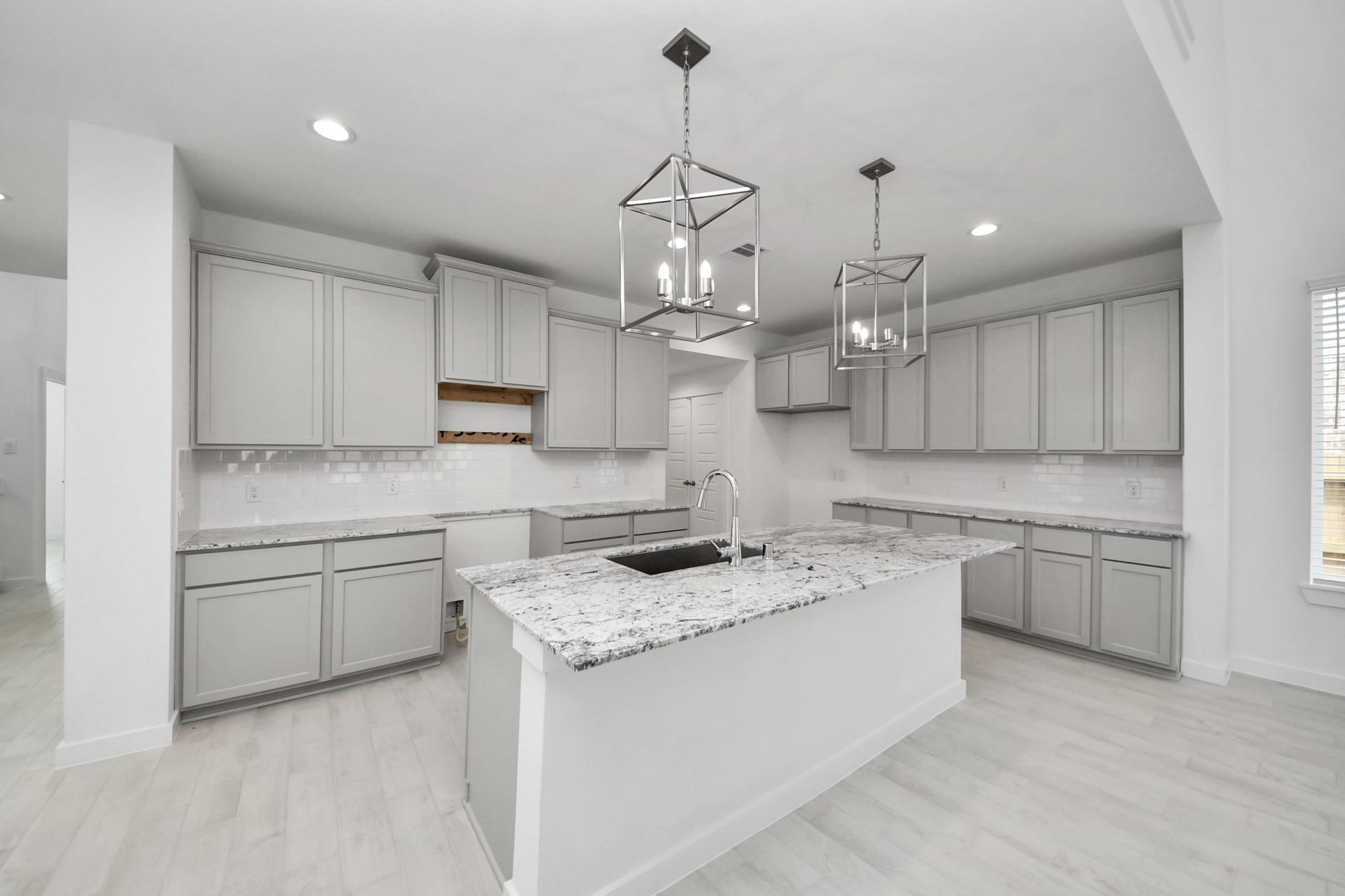 The extended counter area adds both practicality and style, making meal preparation a breeze. Every detail is thoughtfully designed to enhance the kitchen's functionality and aesthetic appeal.