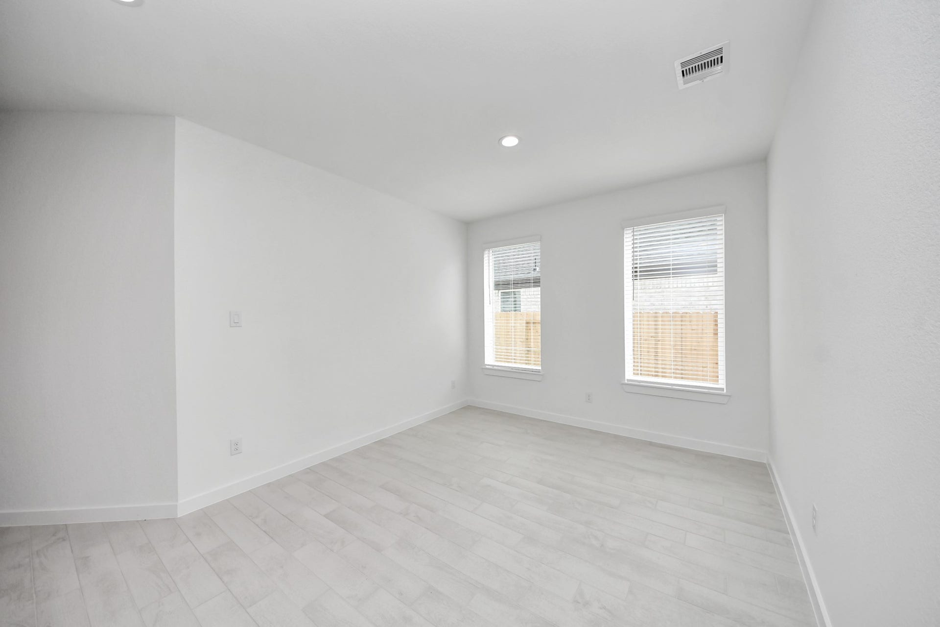 Make memories gathered around the table with your family and friends! This spacious dining room features elegant flooring, custom paint, and adjacent to family room and kitchen for open concept feel.