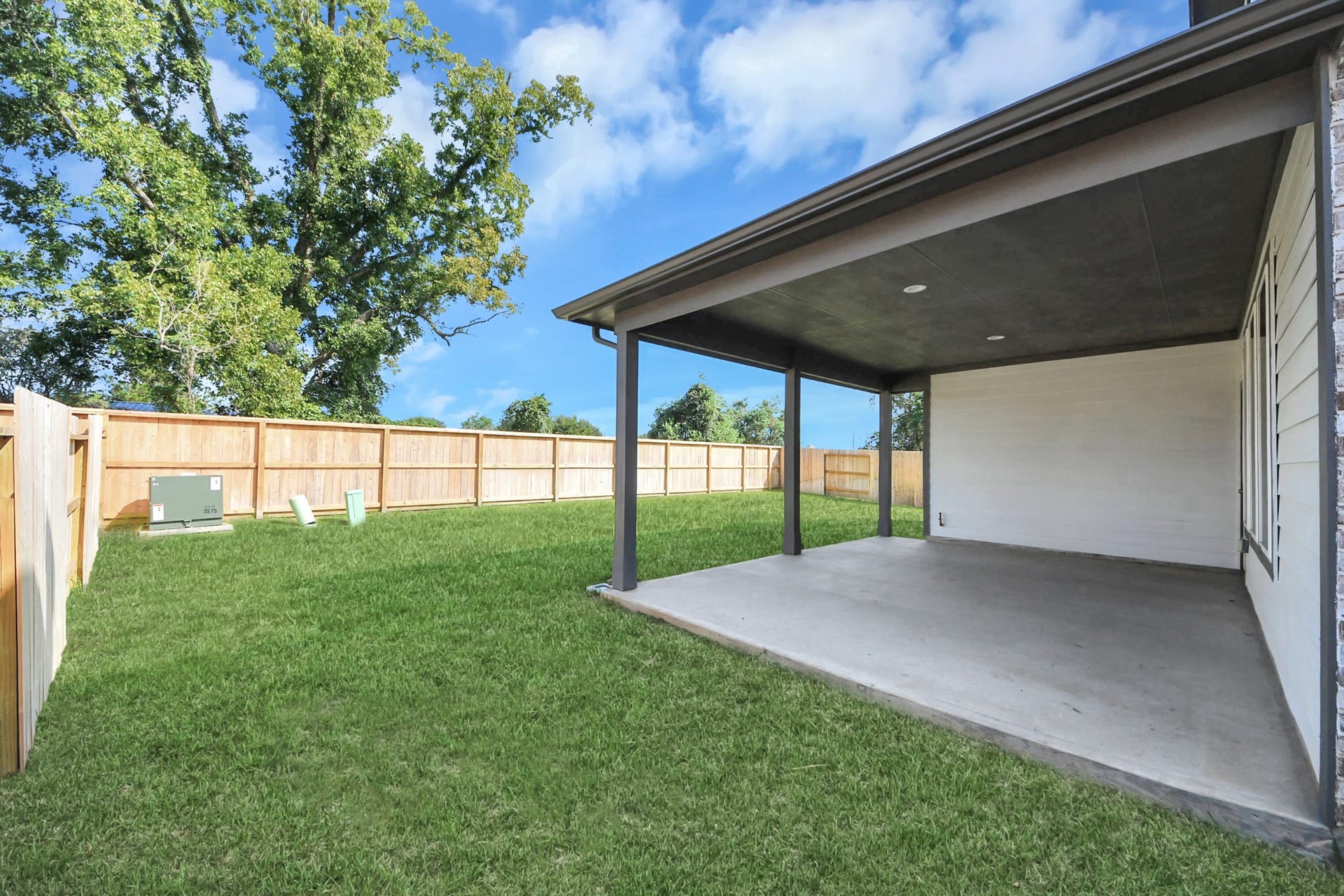 Explore the expansive backyard with its inviting covered patioa perfect blend of space for the kids to play and adults to unwind. Ideal for creating your outdoor oasis, this backyard accommodates patio furniture, a BBQ pit, and endless possibilities for leisure and entertainment.