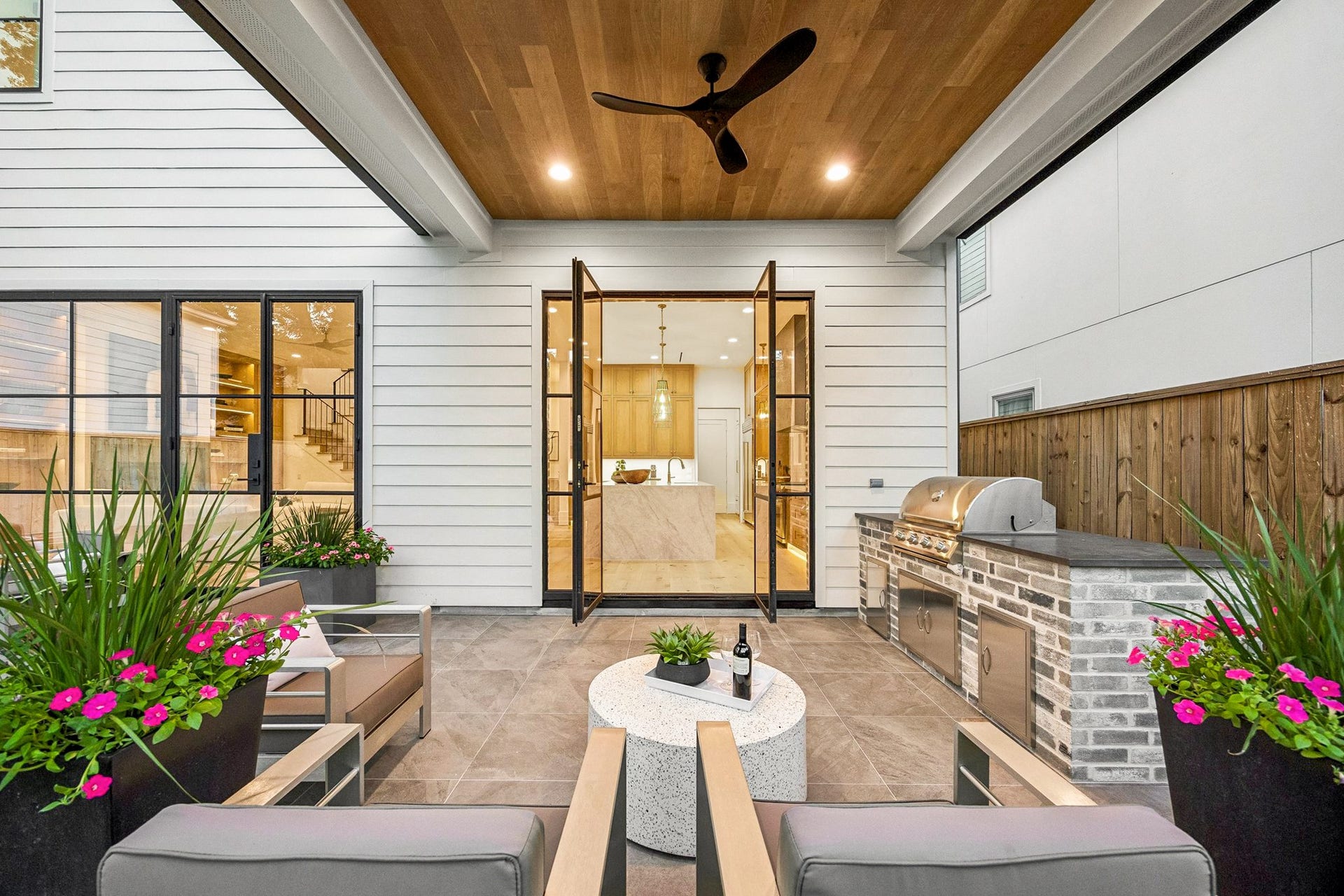 [Outdoor Entertaining] Impeccable landscape and hardscape! Summer kitchen with grill and area for entertaining.