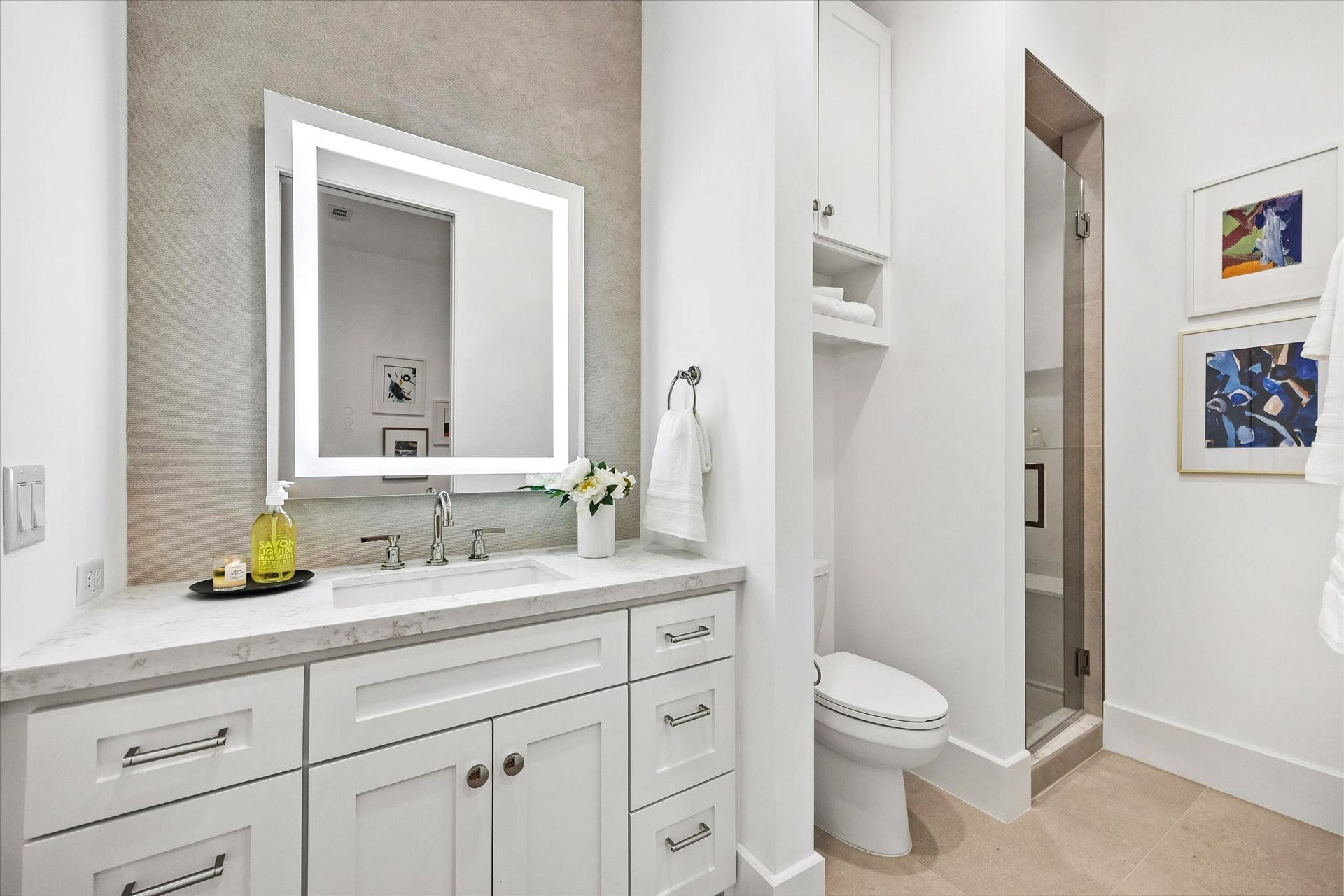 [Secondary Ensuite Bath] All three secondary bedrooms have ensuite  bathrooms with abundant storage.