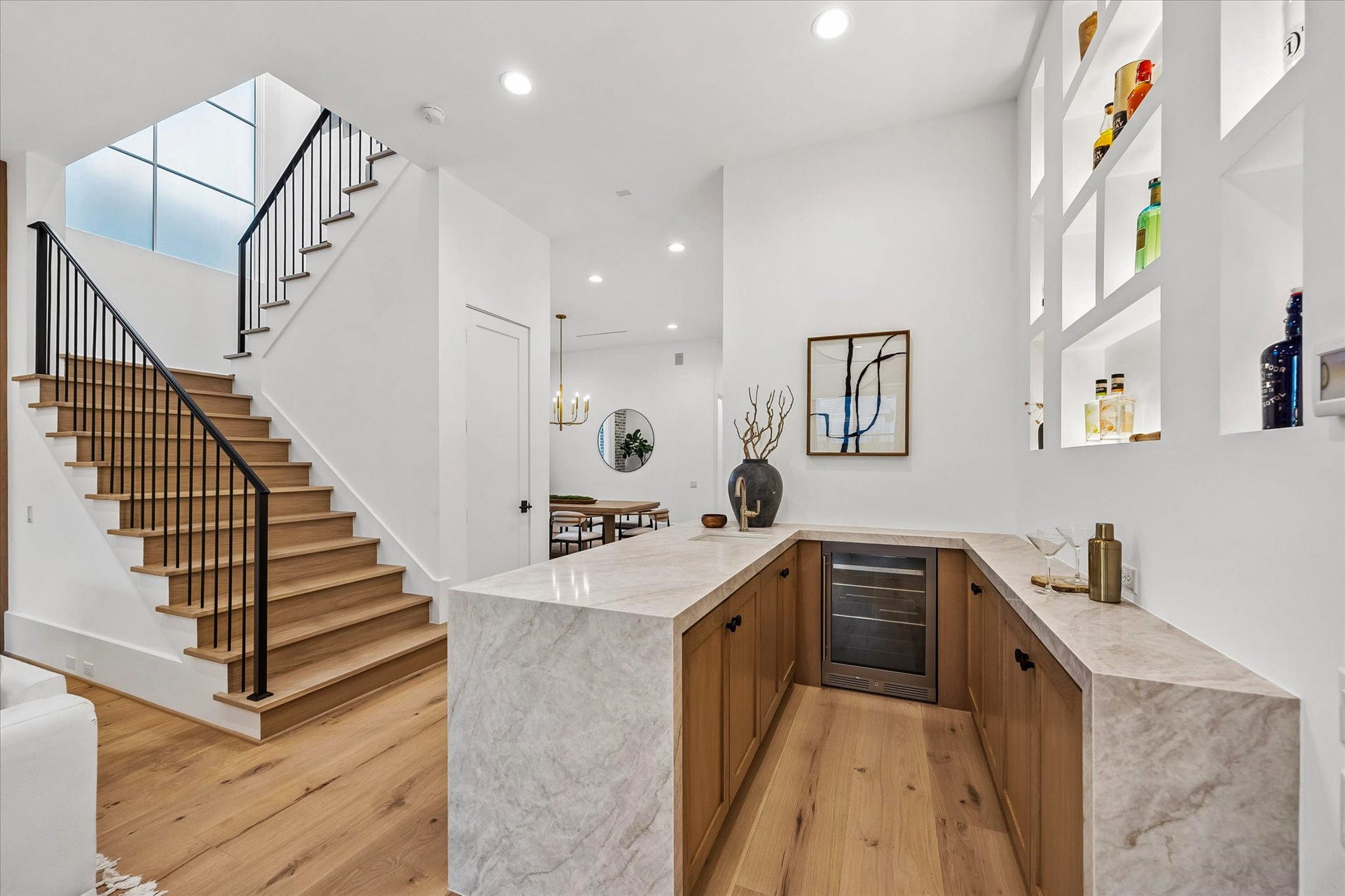 4230 Riley Street, Houston, TX 77005 Stairs lead to the four bedrooms each with ensuite baths, homework station/lounge, and the expansive game room.
