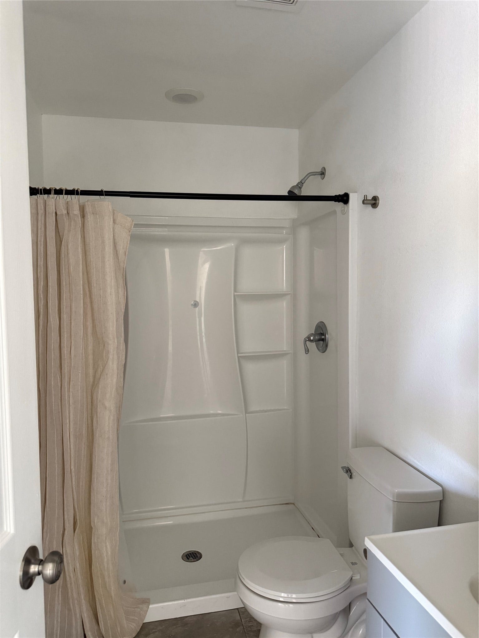 316 20th Street, #1, San Leon, TX 77539 Clean bathroom with a walk-in shower and a modern vanity.