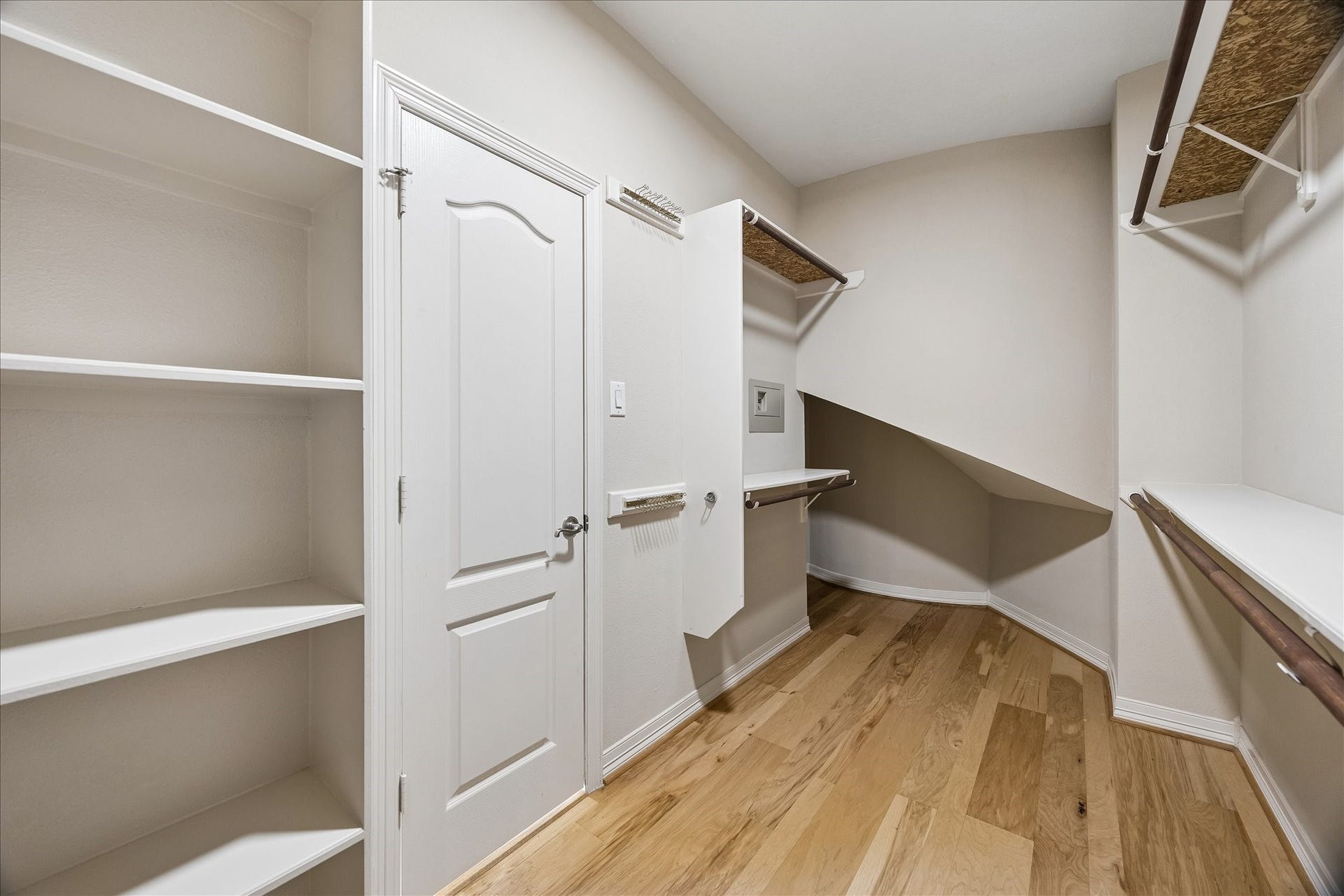 Stay well organized in custom walk in closet.
