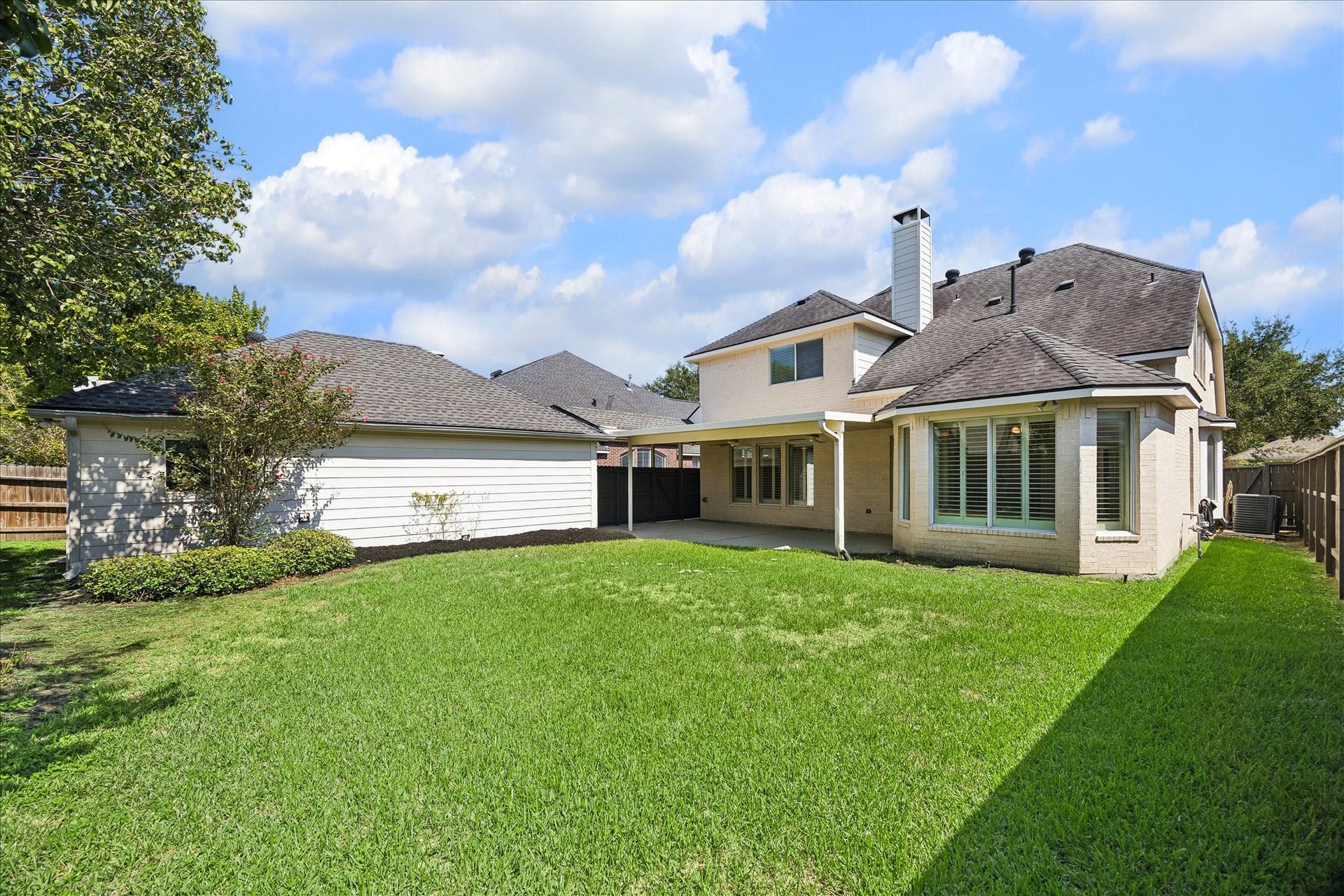 Spacious backyard with tranquil setting for memories to be made.
