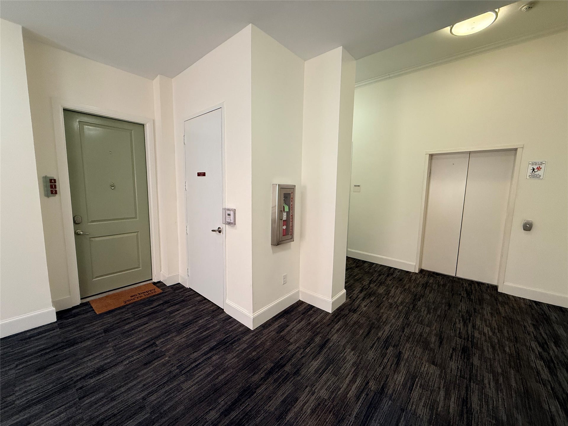300 St Joseph Parkway, #412, Houston, TX 77002 Condo front door next to elevator!
