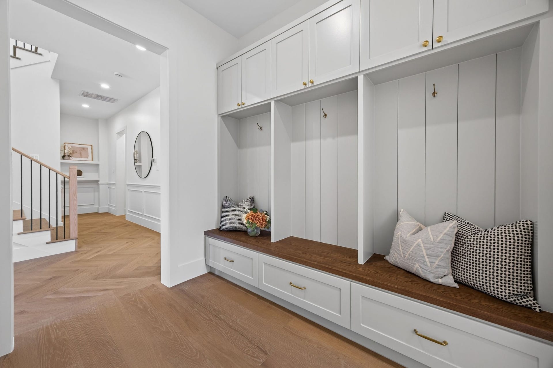 1726 Saxon Drive, Houston, TX 77018 The mud room provides a dedicated place for belongings. It connects to the scullery and entryway, creating a flowing layout throughout the home.