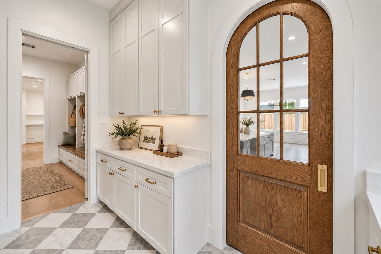 1726 Saxon Drive, Houston, TX 77018 View of the scullery/prep kitchen with a peek into the mud room - notice the character the arched door provides.