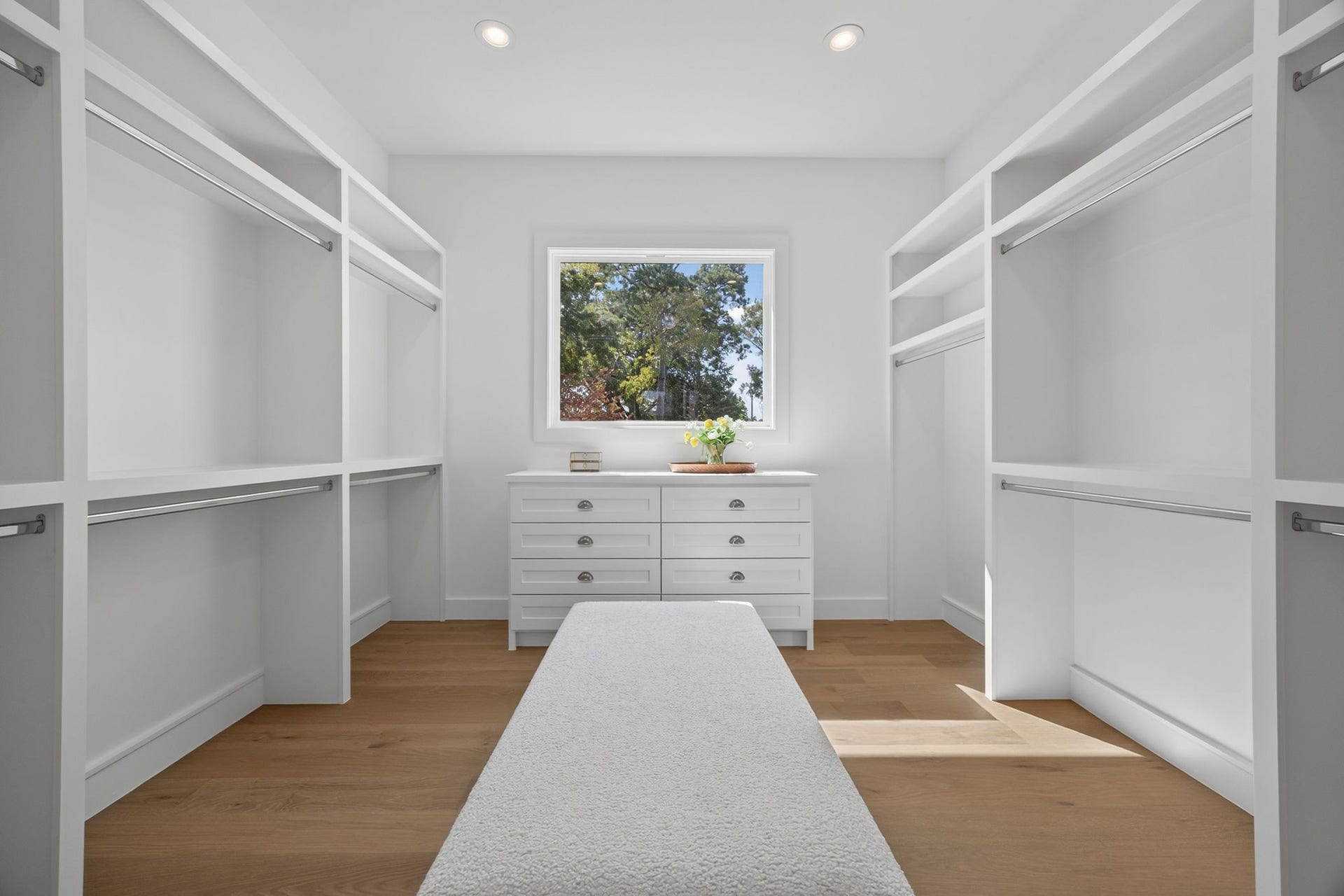 1726 Saxon Drive, Houston, TX 77018 Generous primary closet with beautiful natural light streaming in and tree-top views.