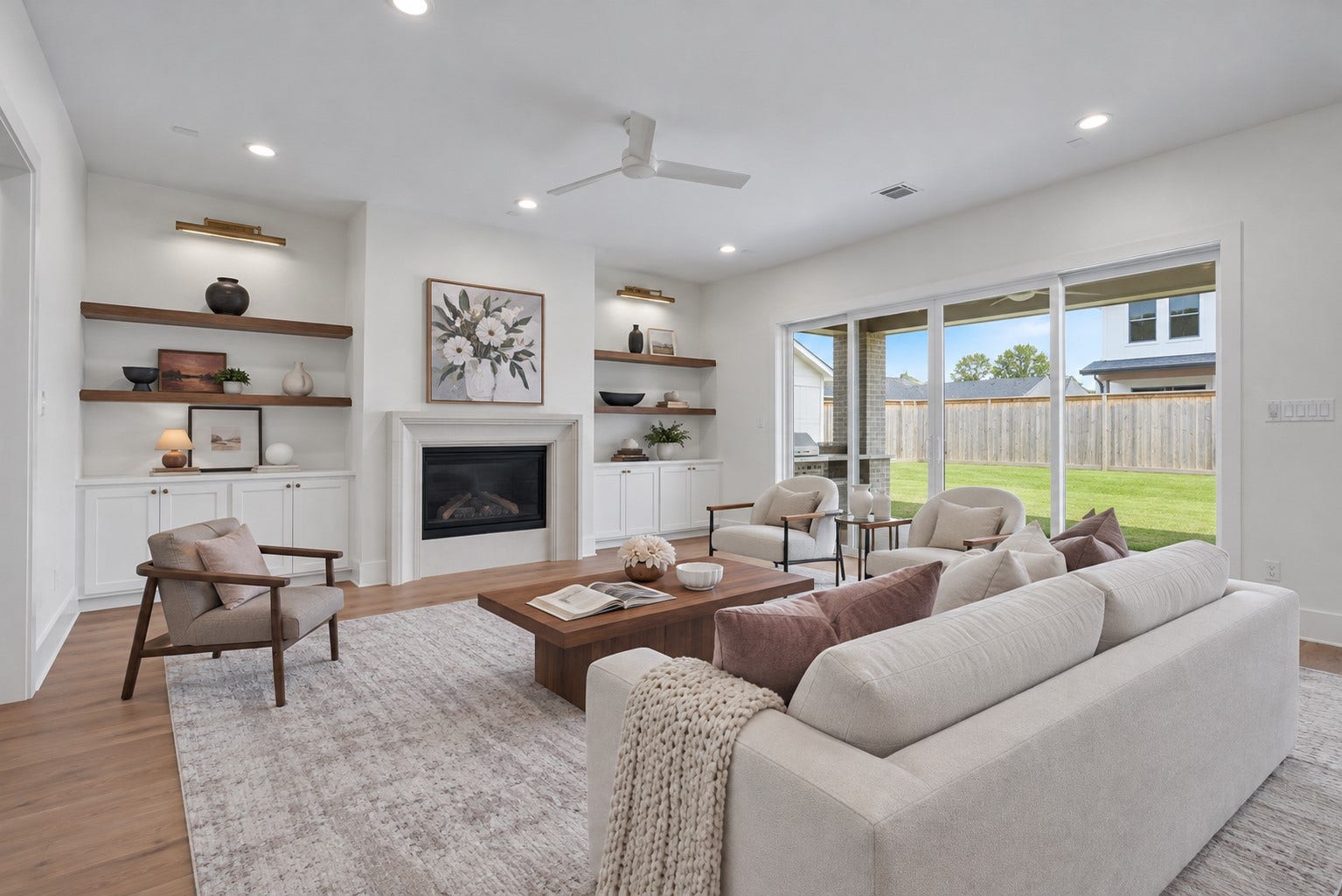 1726 Saxon Drive, Houston, TX 77018 The living room opens to a covered patio and large backyard, creating a seamless connection between indoor and outdoor living.