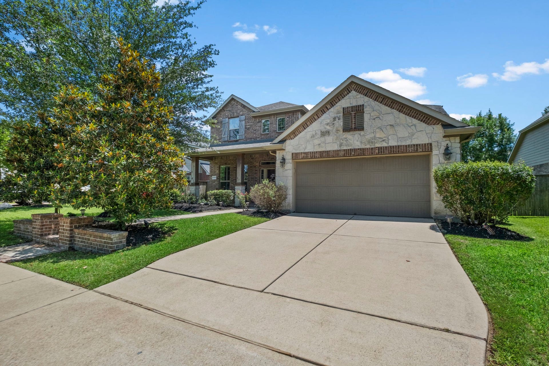 19519 Arbor Lodge Drive, Cypress, TX 77433 Two lovely Magnolia trees add such a charming touch.