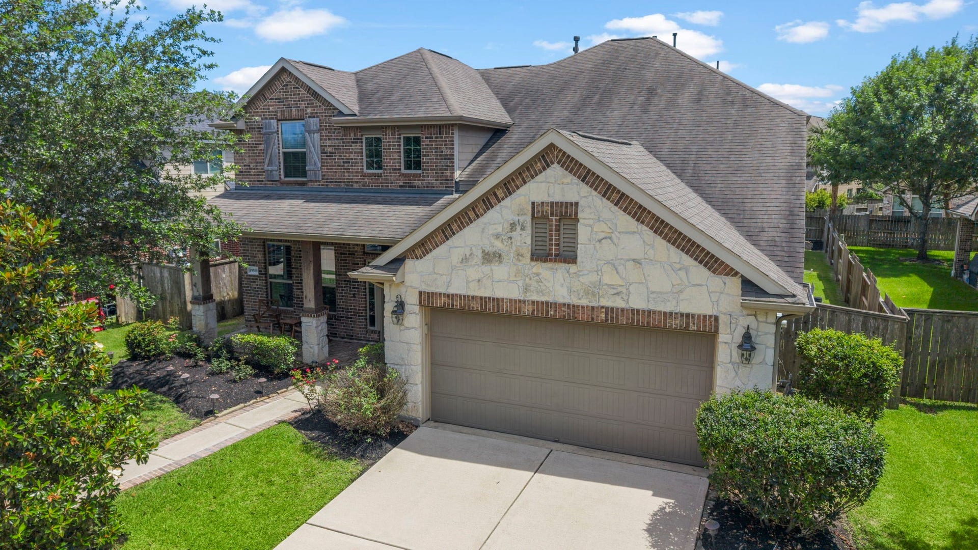 19519 Arbor Lodge Drive, Cypress, TX 77433 The blend of brick and stone & a cozy front porch makes this home a comfortable & enjoyable place to live!